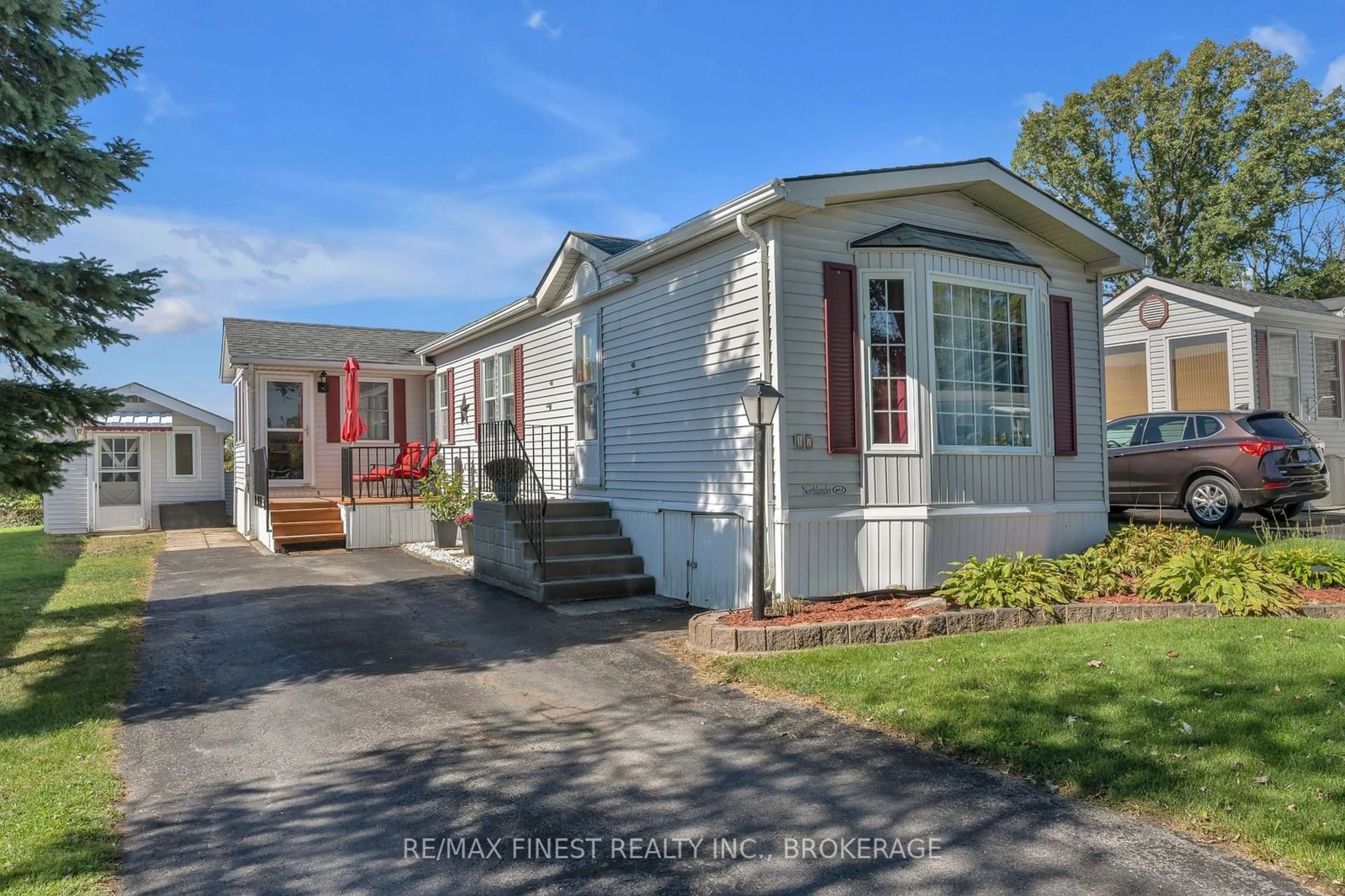 Home with vinyl exterior material, street for 17 ELM St, Greater Napanee Ontario K7R 0E9