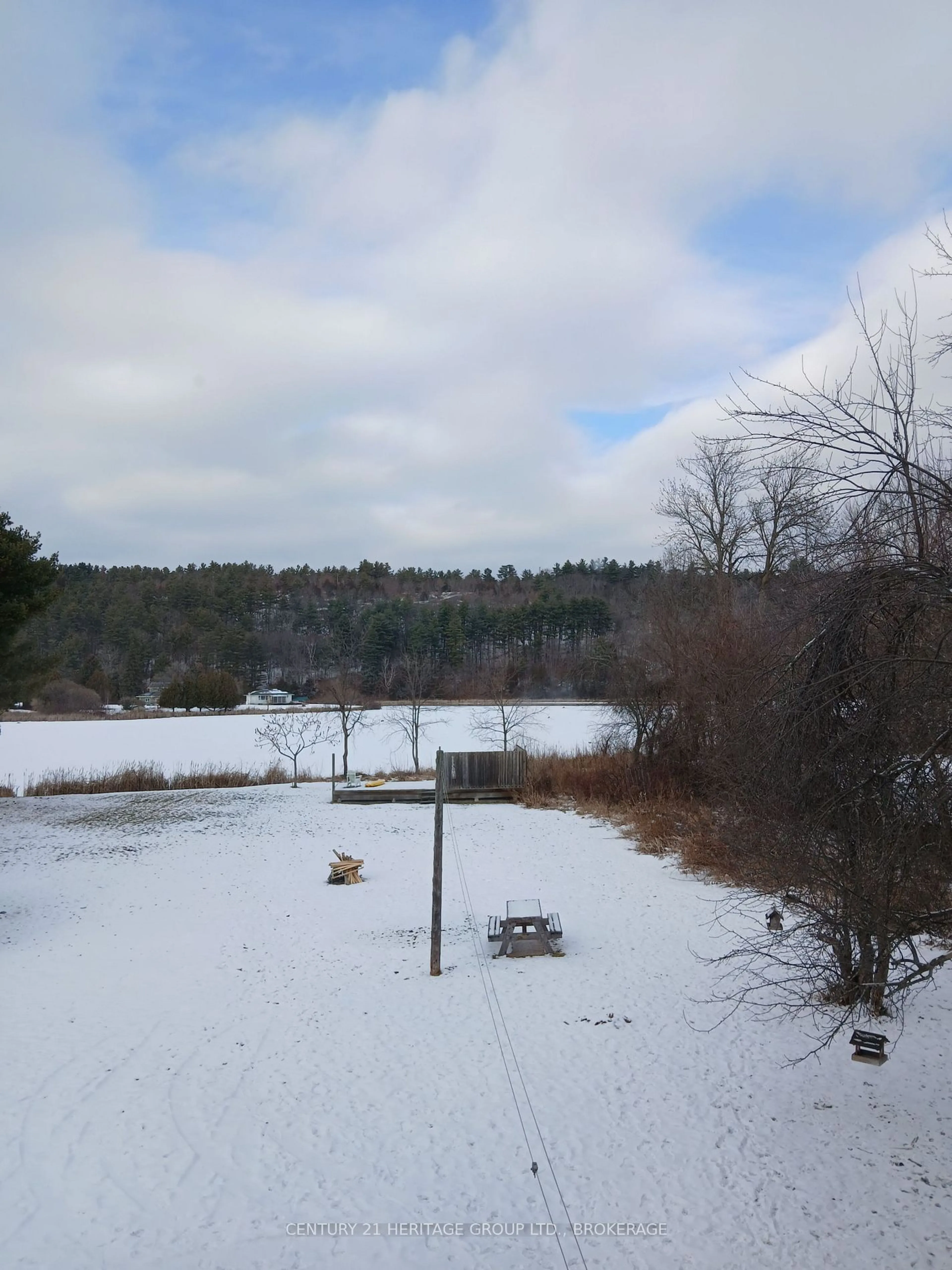 A pic from outside/outdoor area/front of a property/back of a property/a pic from drone, water/lake/river/ocean view for 58 Bedford St, Westport Ontario K0G 1X0