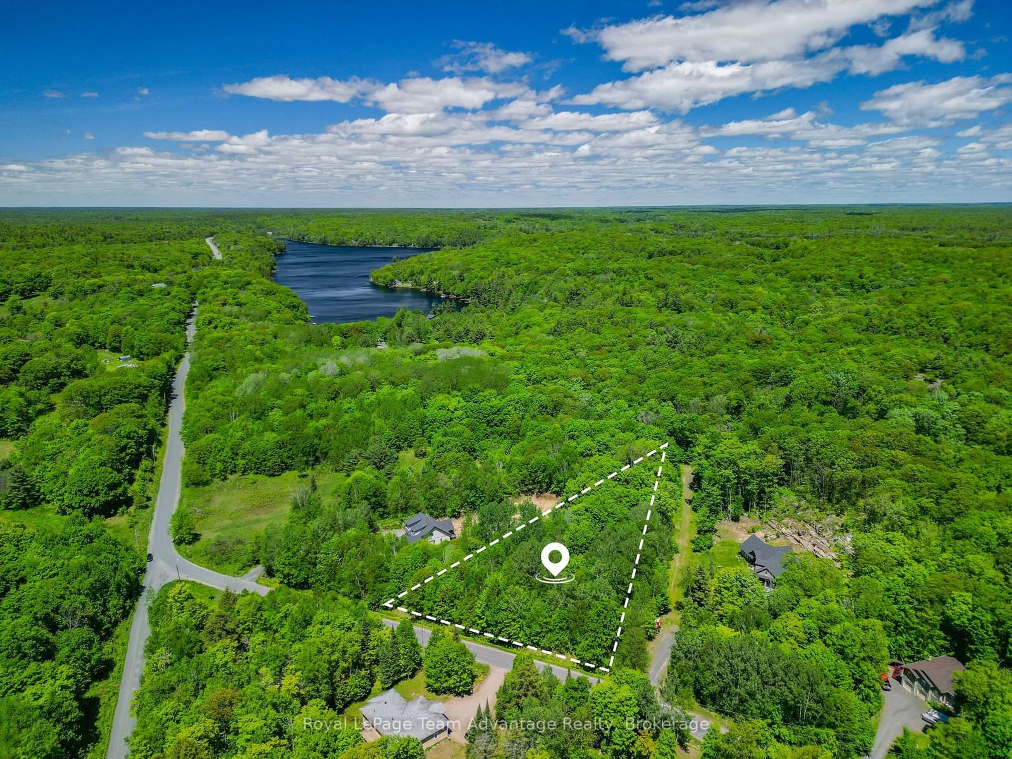 A pic from outside/outdoor area/front of a property/back of a property/a pic from drone, forest/trees view for 4 Mountain Basin Dr, McDougall Ontario P2A 2W9