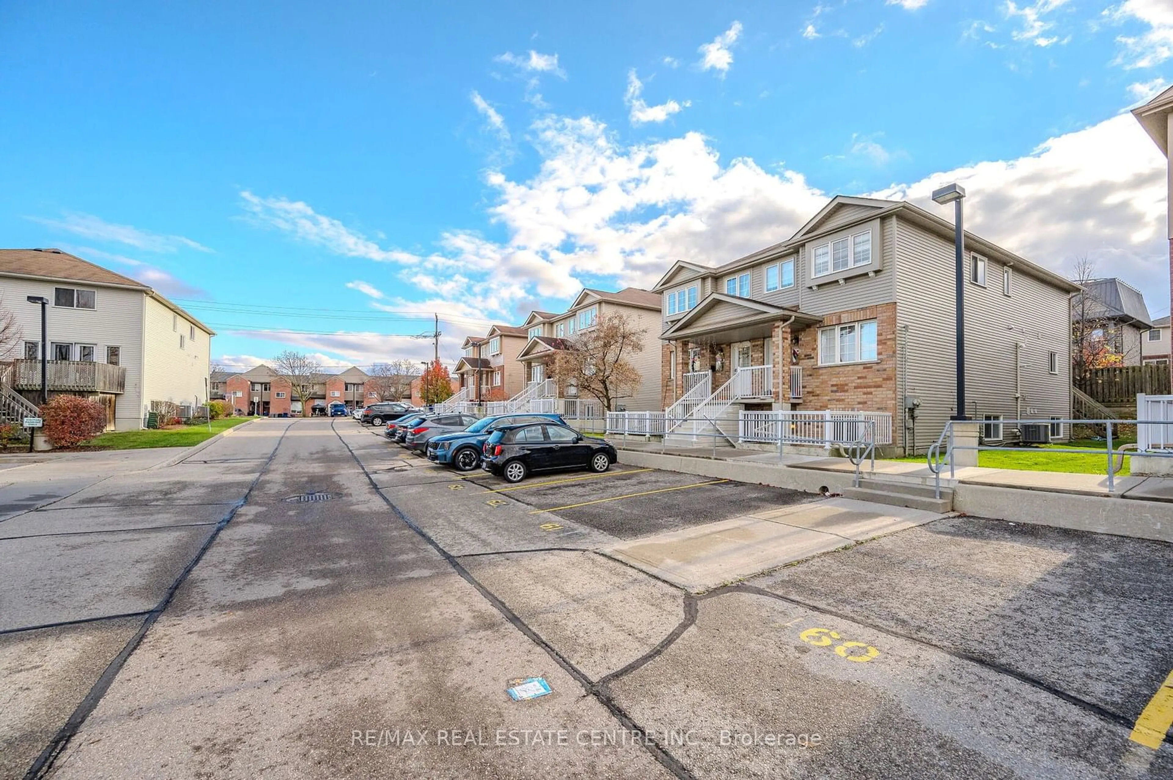 A pic from outside/outdoor area/front of a property/back of a property/a pic from drone, street for 50 Howe Dr #3D, Waterloo Ontario N2E 0A3