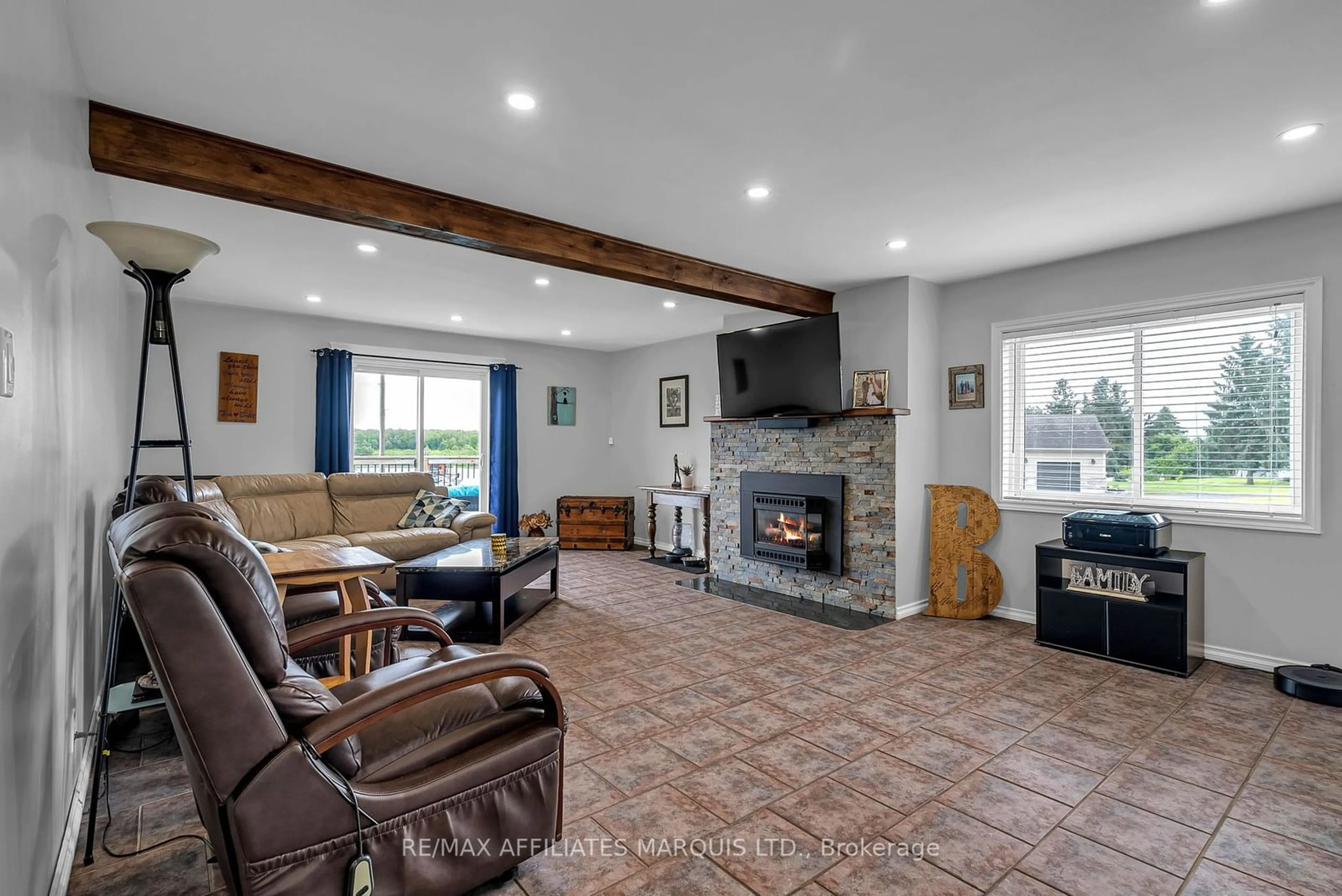 Living room with furniture, ceramic/tile floor for 19448 COUNTY ROAD 2 Rd, South Glengarry Ontario K0C 2E0