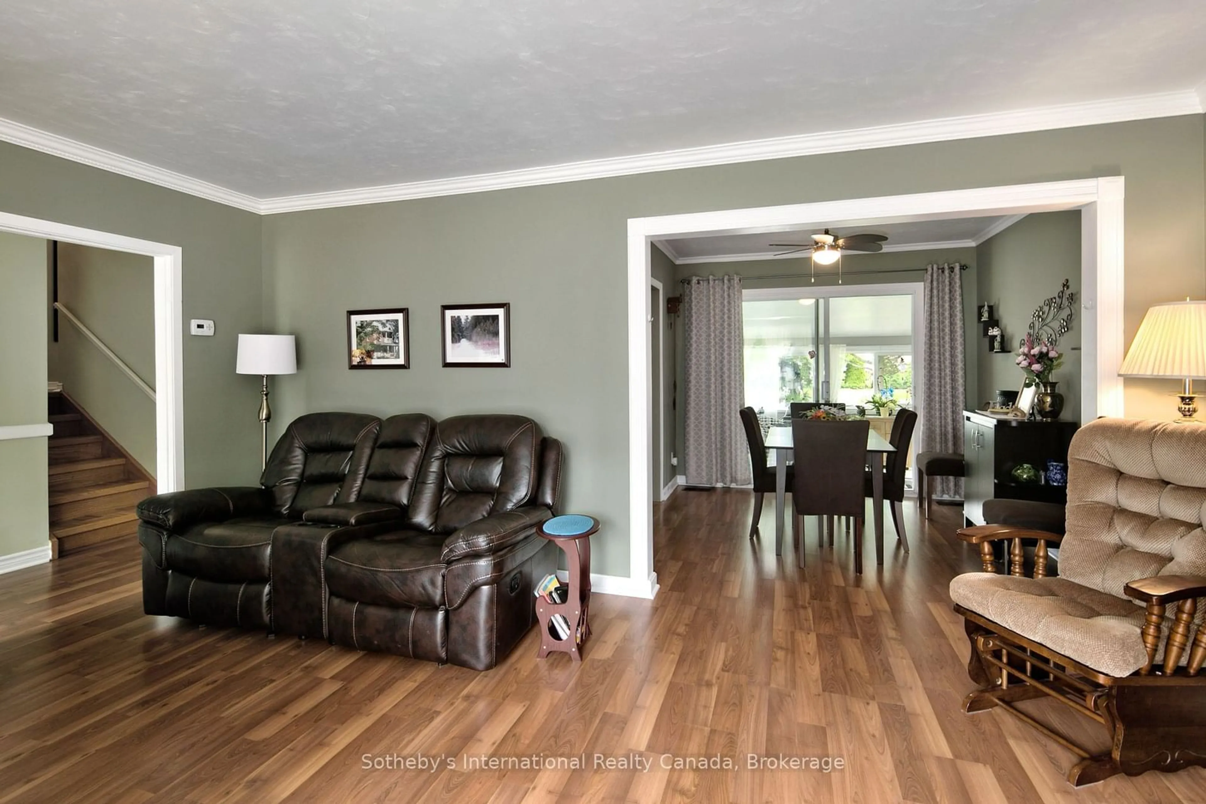 Living room with furniture, wood/laminate floor for 53 Paul St, Meaford Ontario N4L 1C9