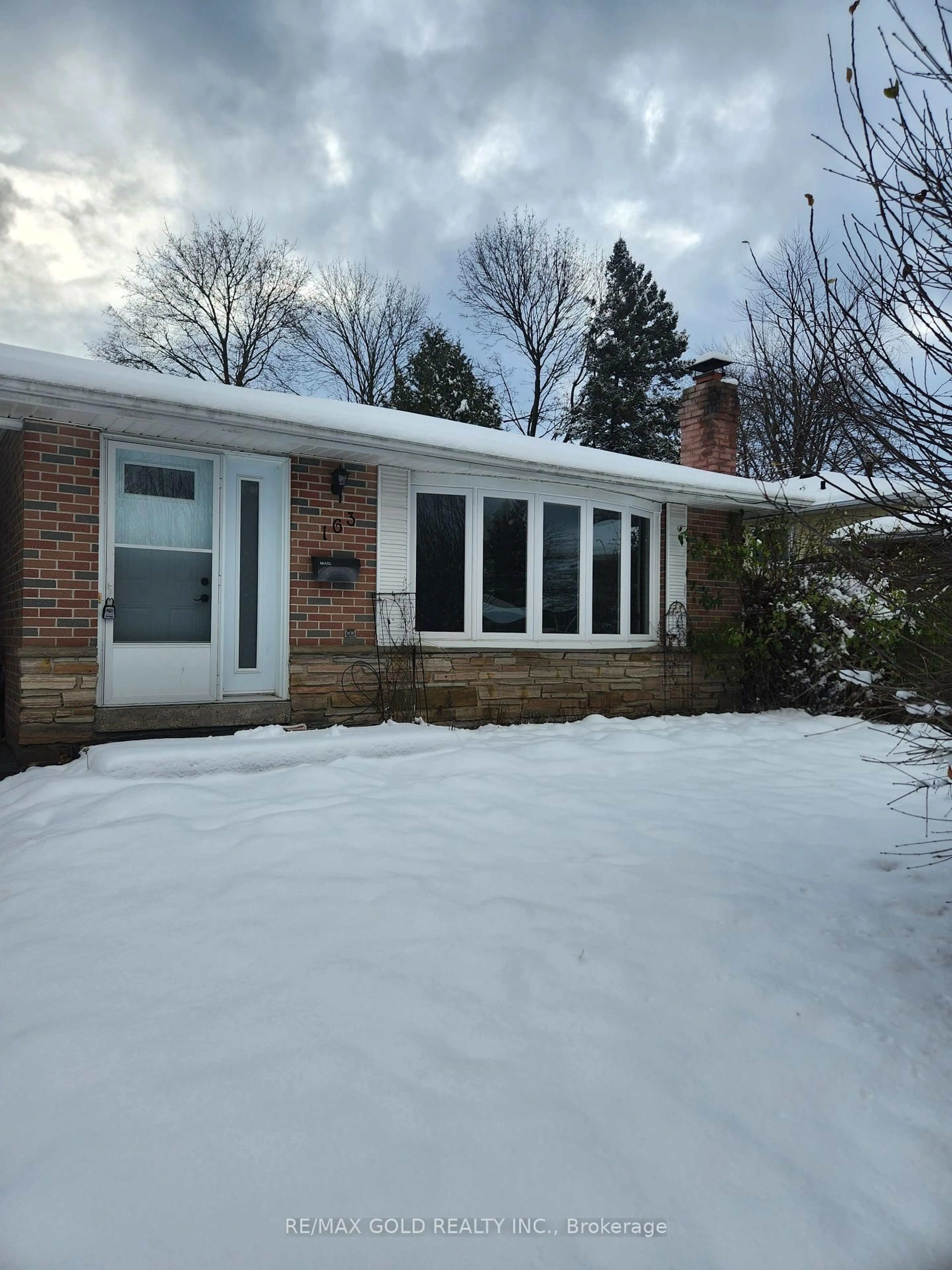 Home with vinyl exterior material, street for 163 Hazelglen Dr, Kitchener Ontario N2M 2E6