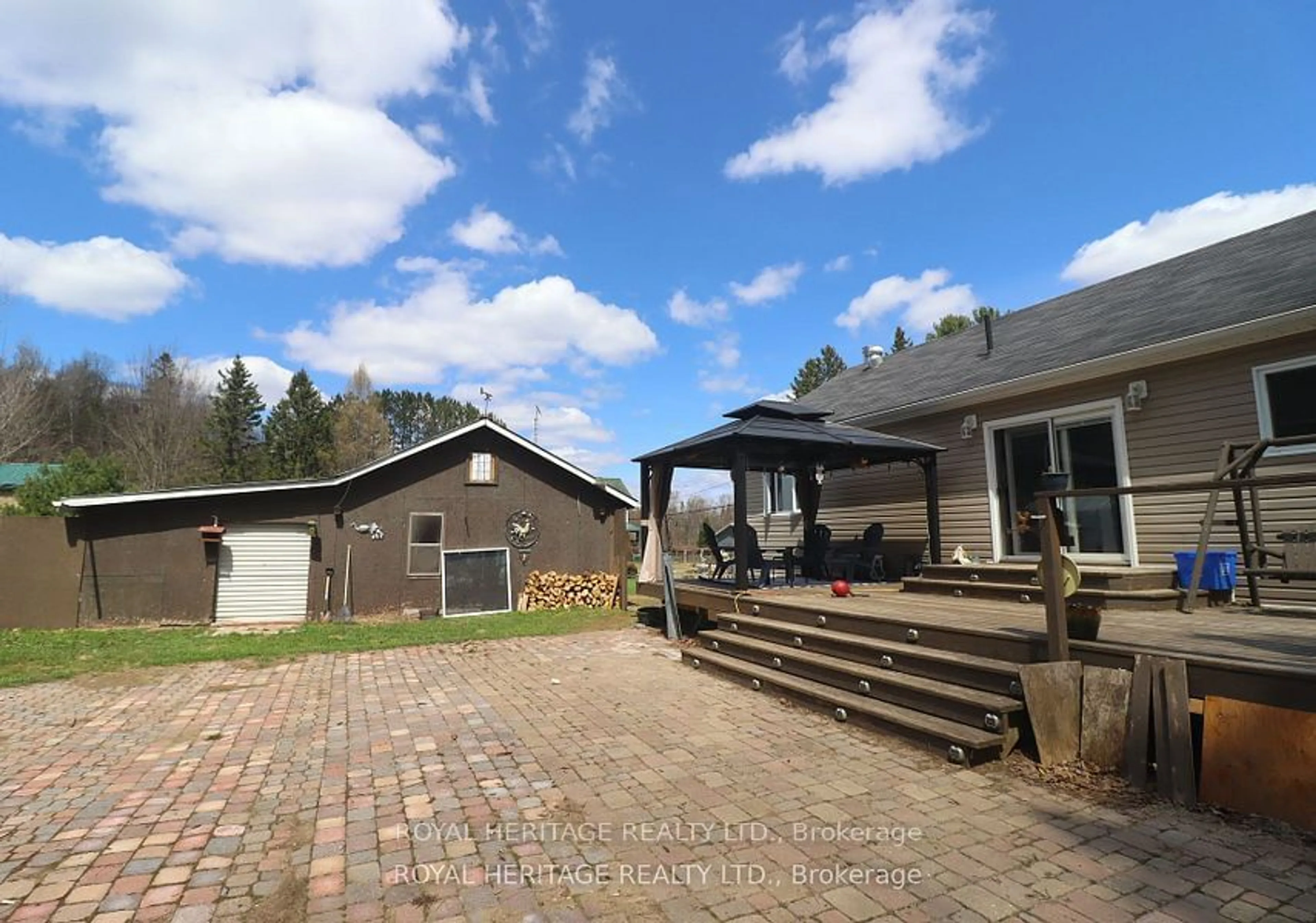 A pic from outside/outdoor area/front of a property/back of a property/a pic from drone, unknown for 1025 Dewey St, Highlands East Ontario K0M 1R0