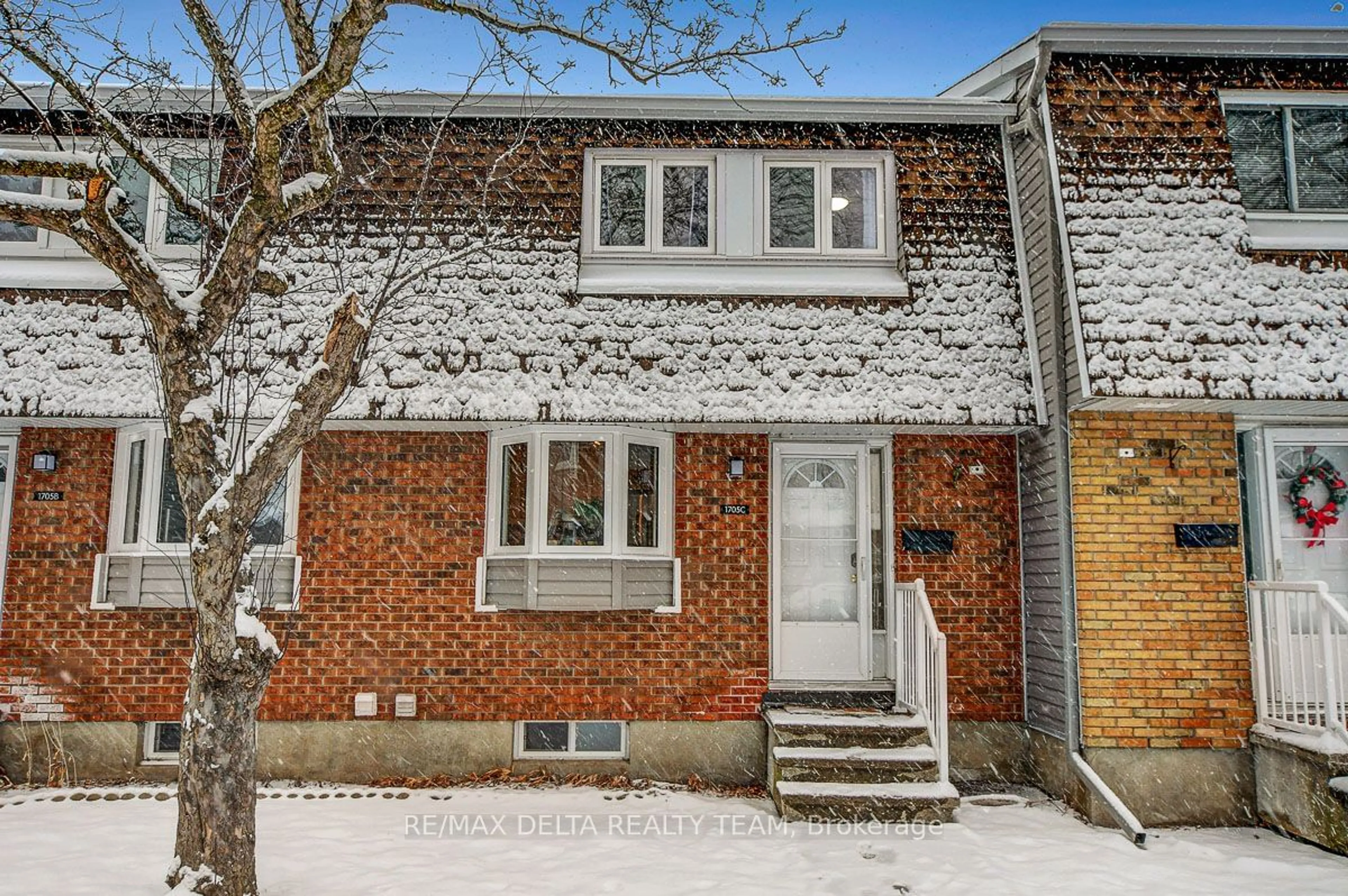 Home with brick exterior material, street for 1705 Lamoureux Dr #C, Orleans - Cumberland and Area Ontario K1E 2N3