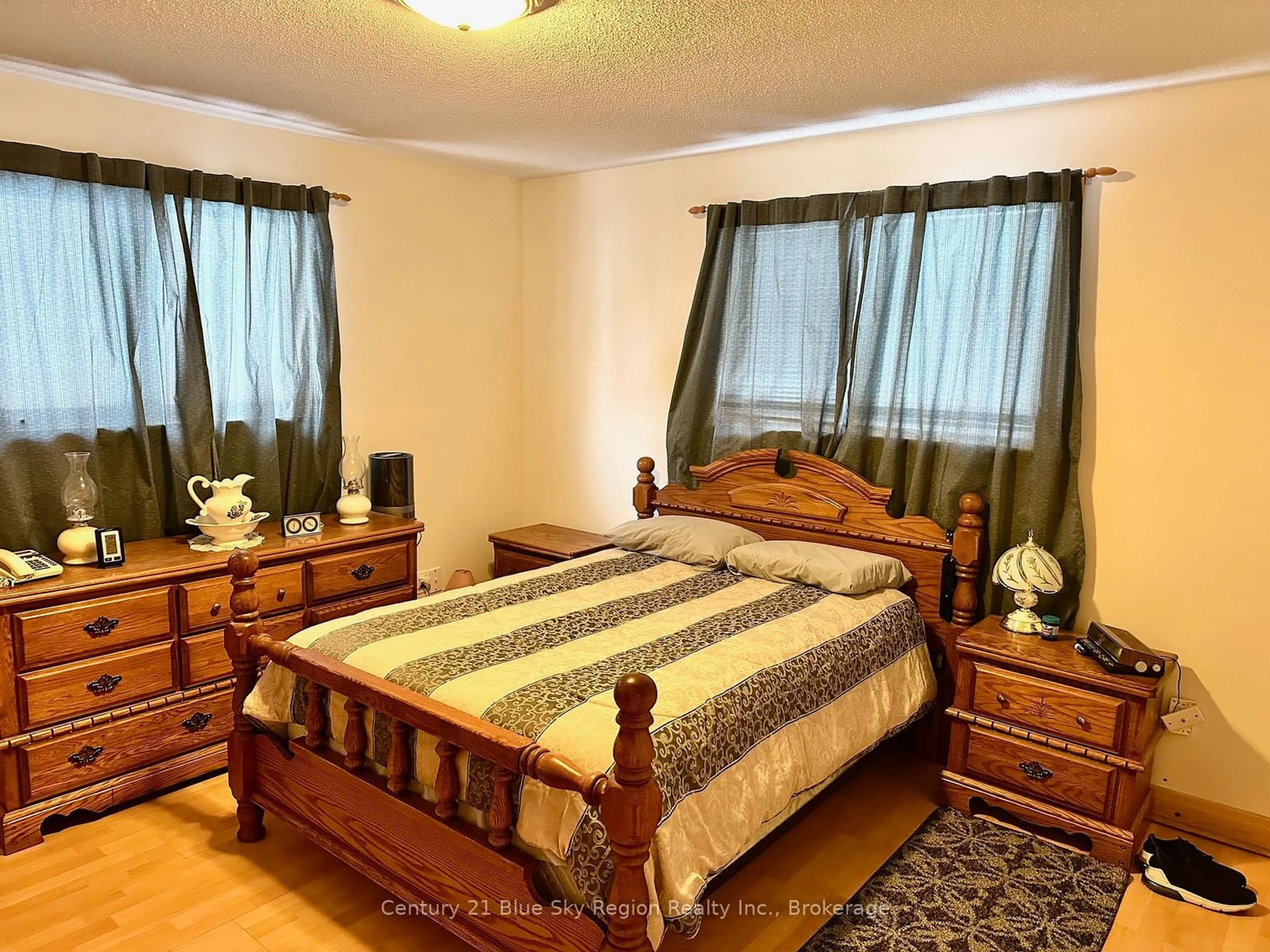 Bedroom with bed, wood/laminate floor for 361 Fifth St, Mattawa Ontario P0V 1V0