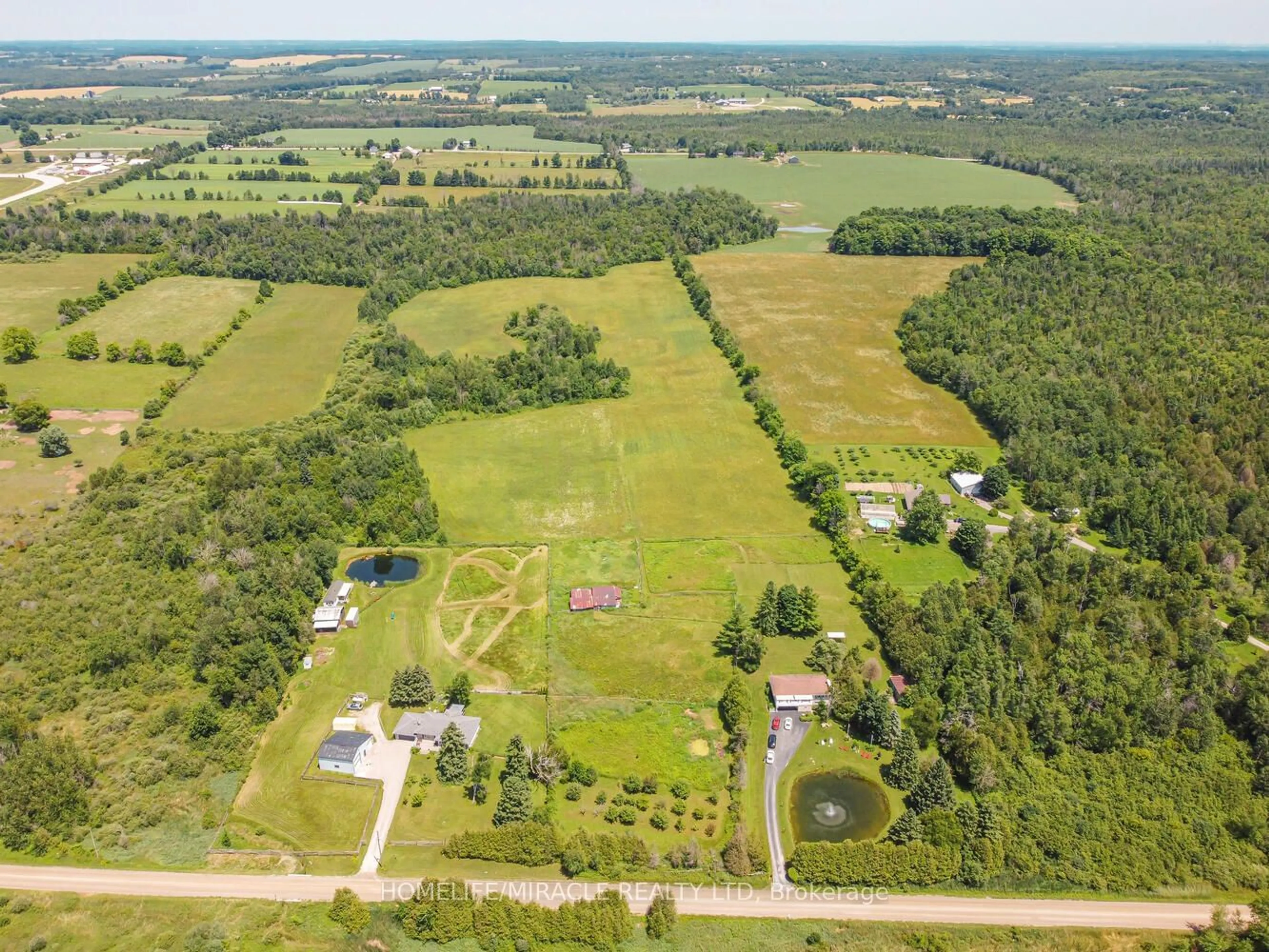 A pic from outside/outdoor area/front of a property/back of a property/a pic from drone, forest/trees view for 5183 First Line, Erin Ontario L7J 2L9