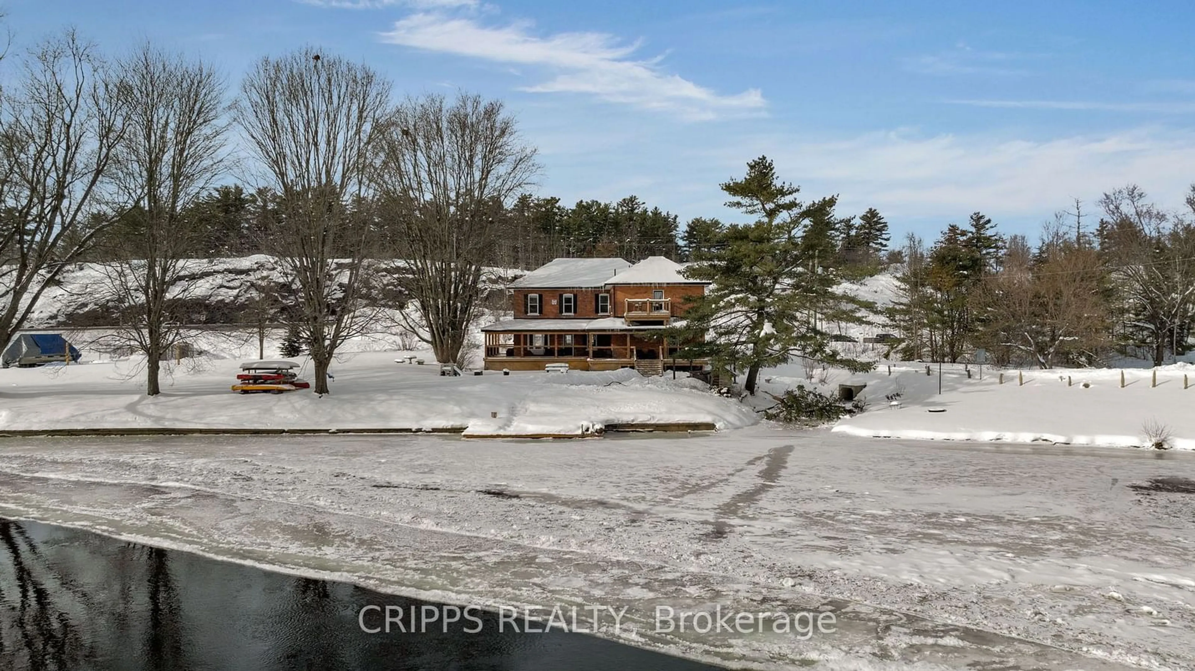 A pic from outside/outdoor area/front of a property/back of a property/a pic from drone, water/lake/river/ocean view for 1002 Cowbell Lane, Gravenhurst Ontario P0E 1N0