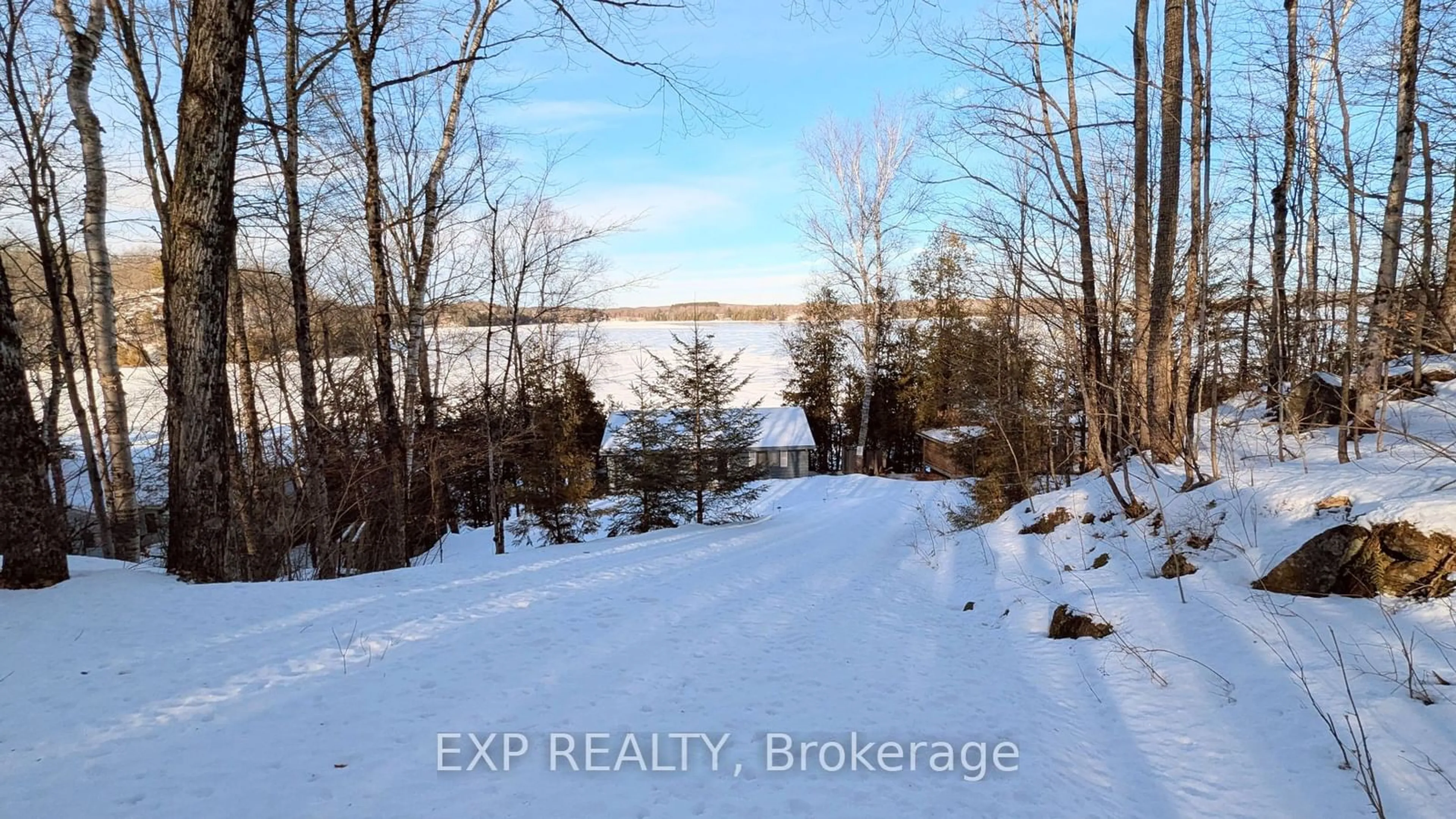 A pic from outside/outdoor area/front of a property/back of a property/a pic from drone, water/lake/river/ocean view for 400B Gilbert Bay Lane, Wollaston Ontario K0L 1P0