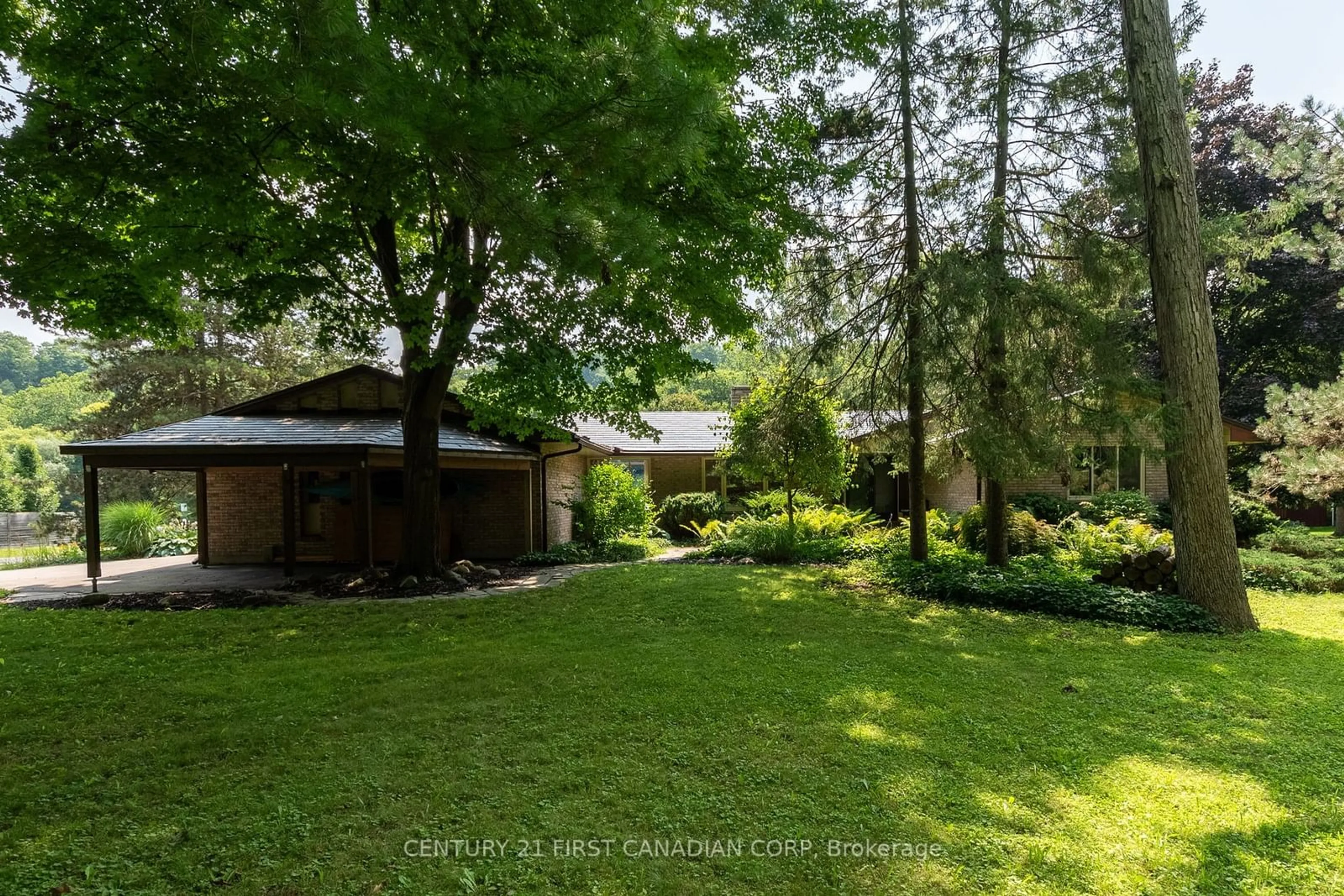 A pic from outside/outdoor area/front of a property/back of a property/a pic from drone, forest/trees view for 55 Blackburn Cres, Middlesex Centre Ontario N0L 1R0