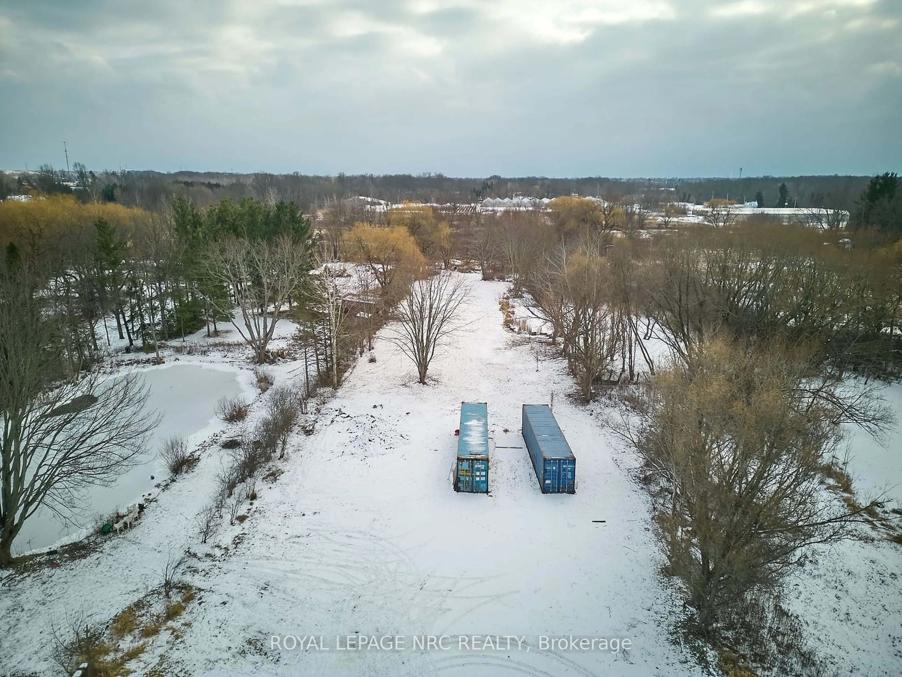 A pic from outside/outdoor area/front of a property/back of a property/a pic from drone, forest/trees view for 2523 Port Robinson Rd, Thorold Ontario L3B 5N5