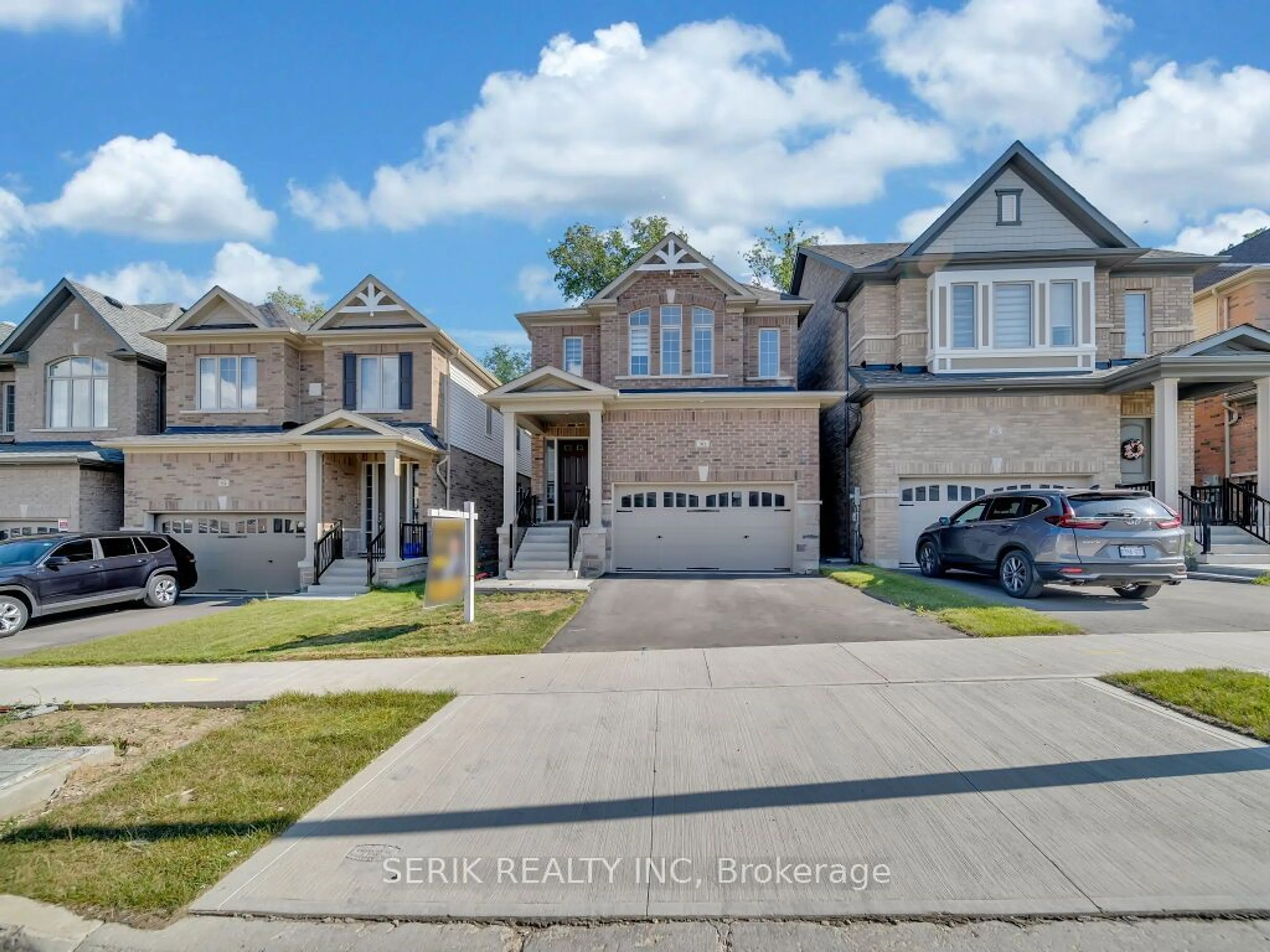 Home with brick exterior material, street for 90 Broadacre Dr, Kitchener Ontario N2R 0S5