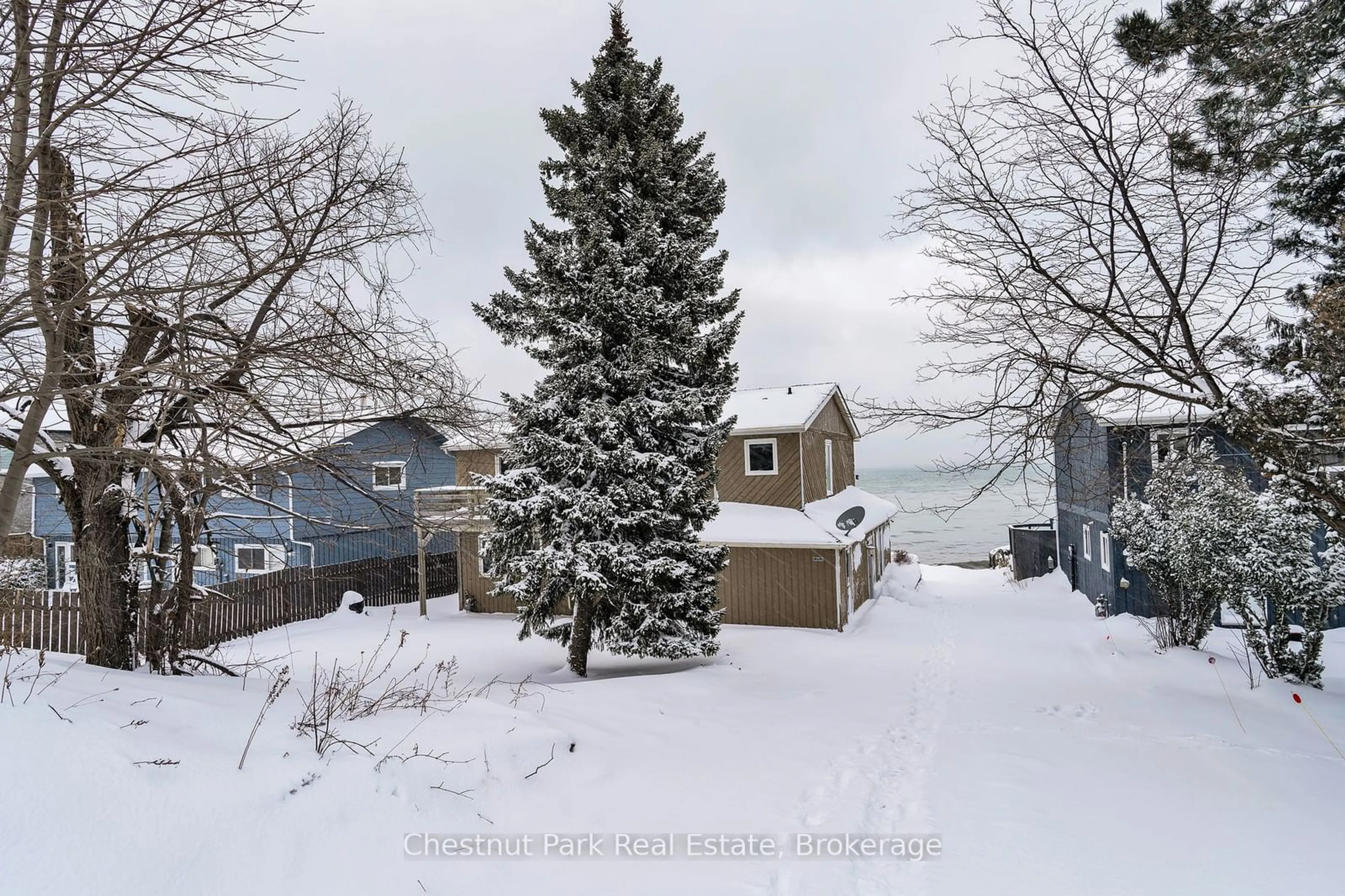 A pic from outside/outdoor area/front of a property/back of a property/a pic from drone, street for 209515 Highway 26, Blue Mountains Ontario L9Y 0S5