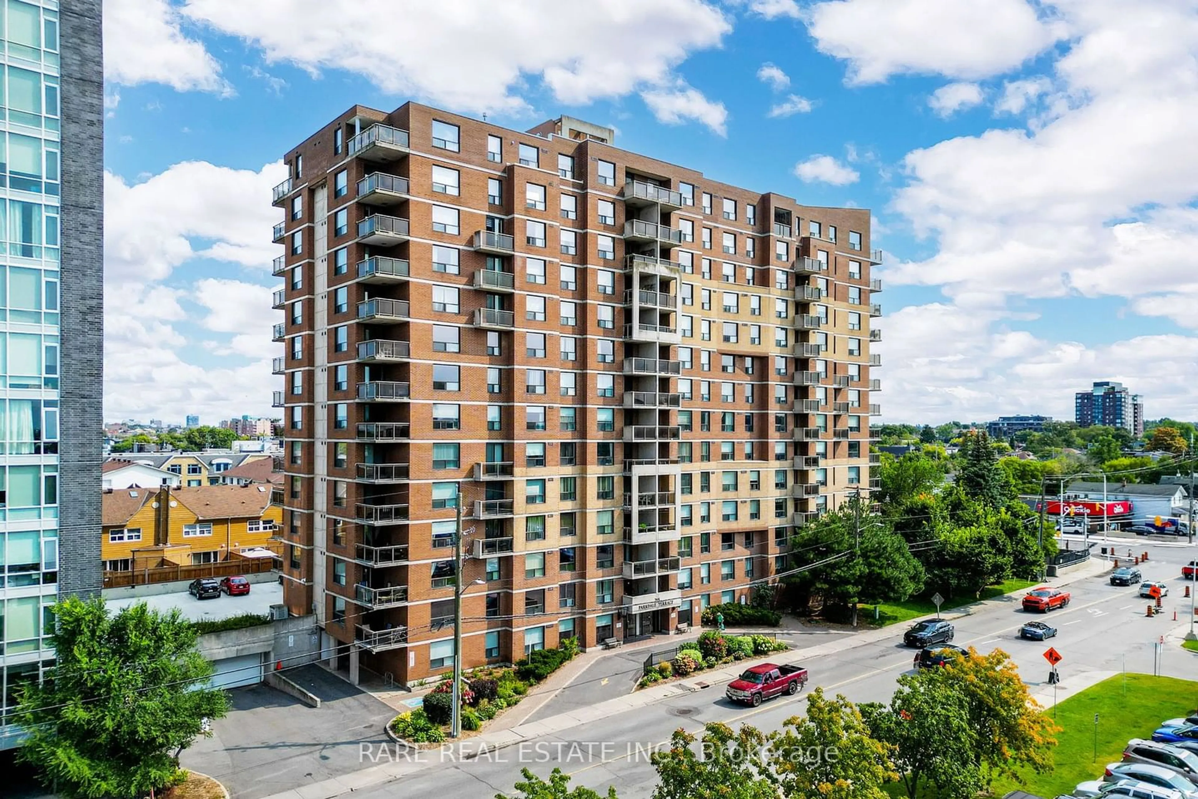 A pic from outside/outdoor area/front of a property/back of a property/a pic from drone, city buildings view from balcony for 215 Parkdale Ave #505, Ottawa Ontario K1Y 4T8