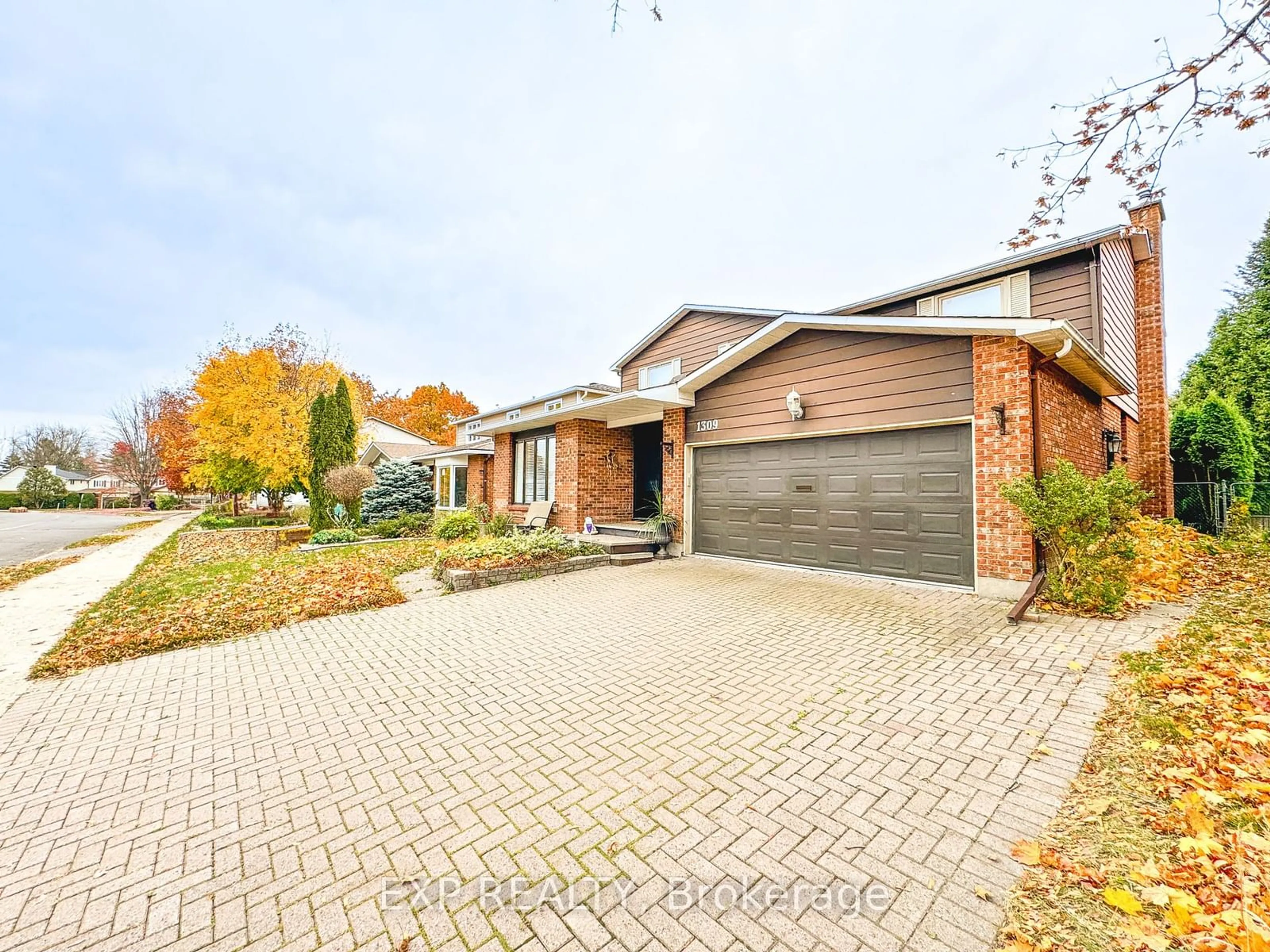 Home with brick exterior material, street for 1309 Plante Dr, Ottawa Ontario K1V 9Z8