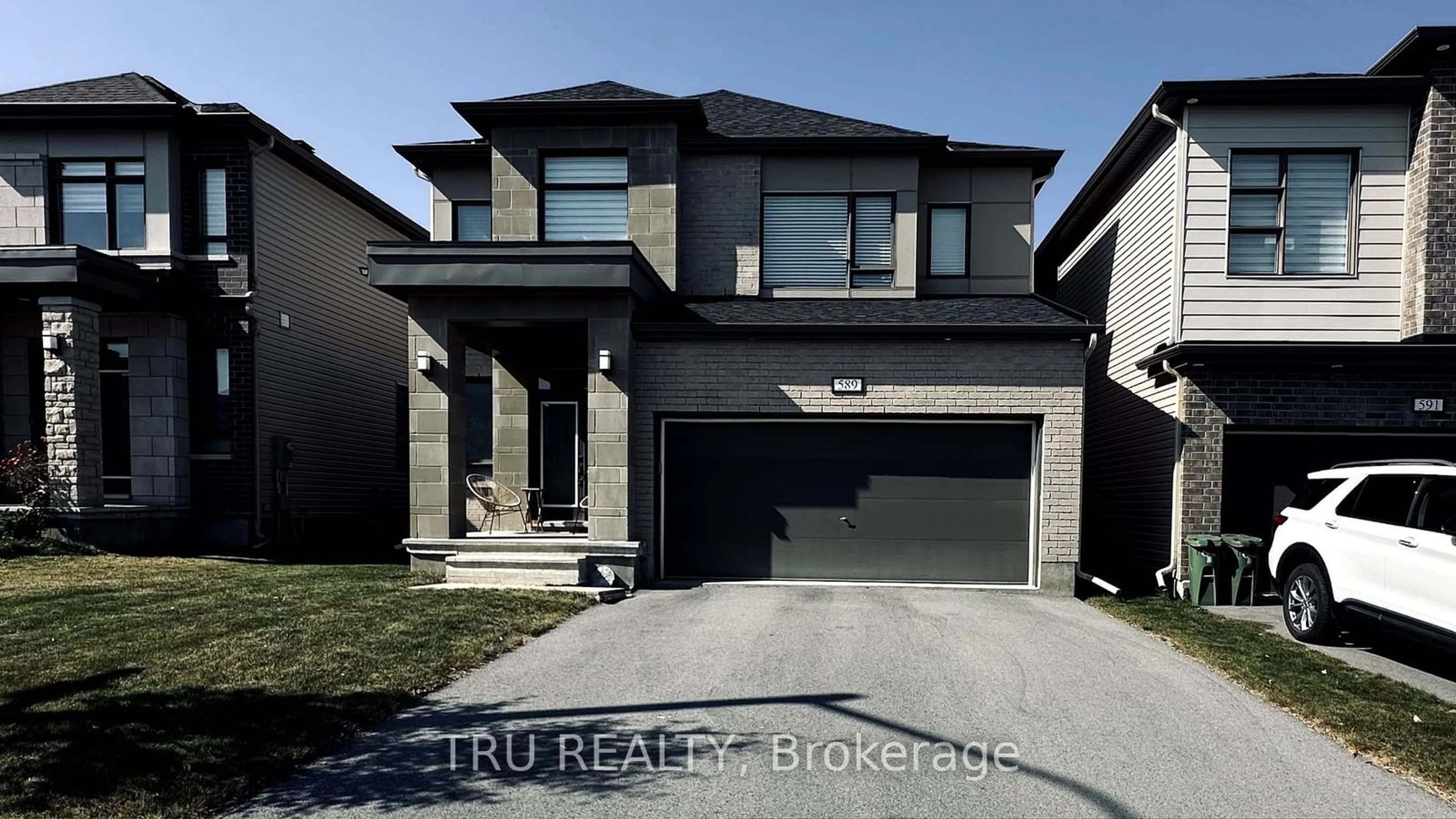 Home with brick exterior material, street for 589 Parade Dr, Stittsville - Munster - Richmond Ontario K2S 0Y3