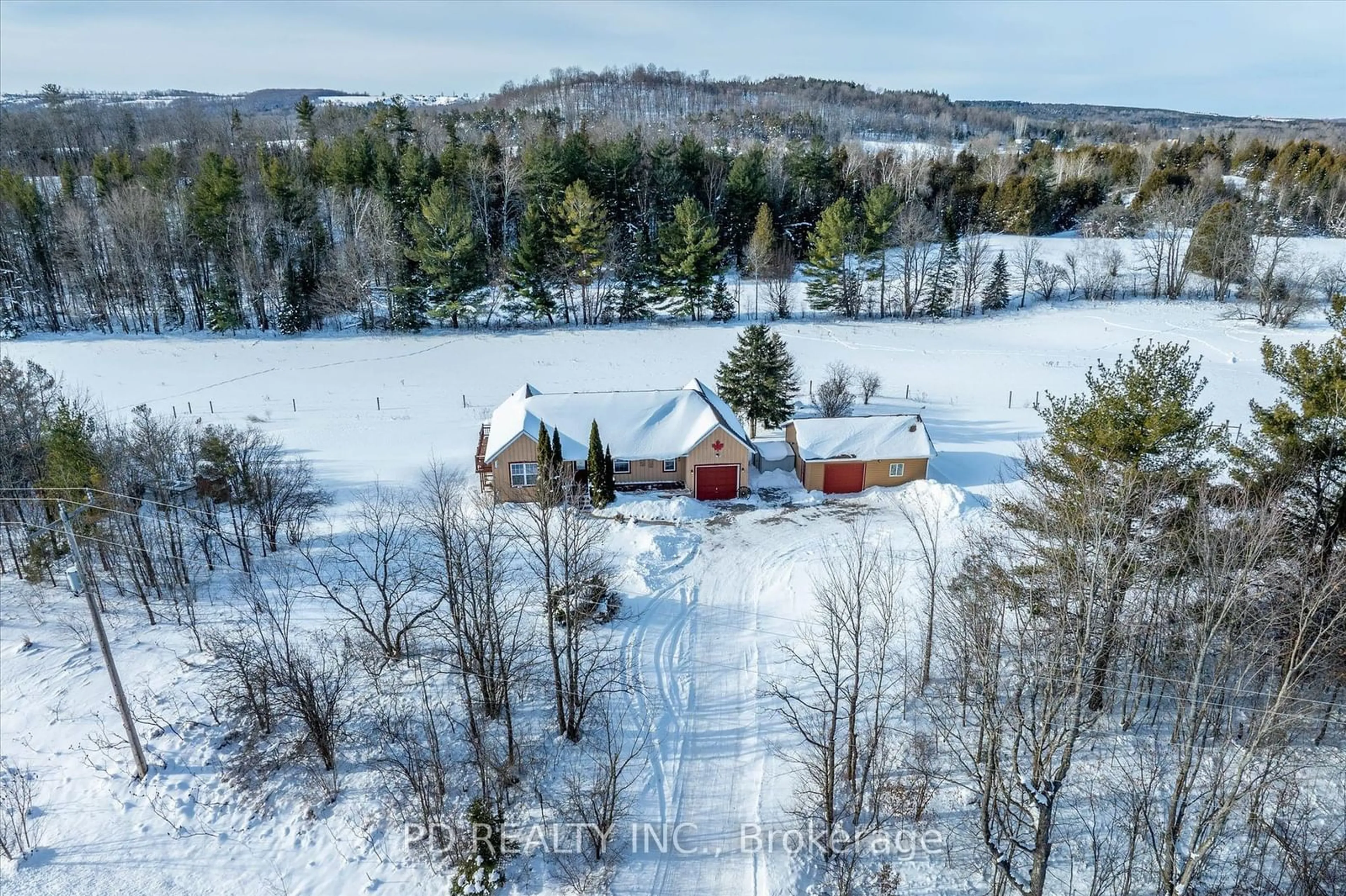 A pic from outside/outdoor area/front of a property/back of a property/a pic from drone, water/lake/river/ocean view for 595 Ski Hill Rd, Kawartha Lakes Ontario L0A 1A0