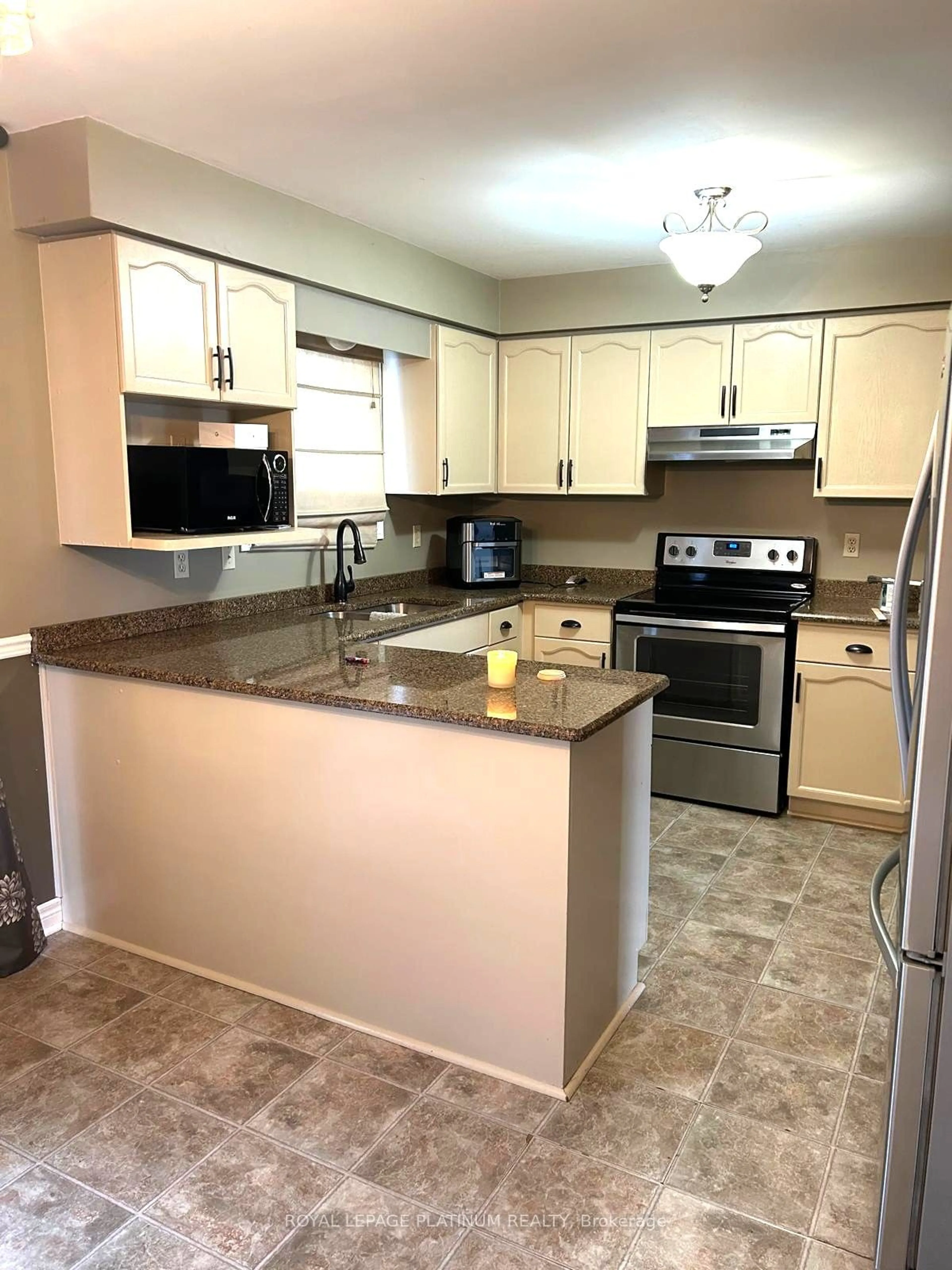 Open concept kitchen, ceramic/tile floor for 1914 Marconi Blvd, London Ontario N5V 4T5