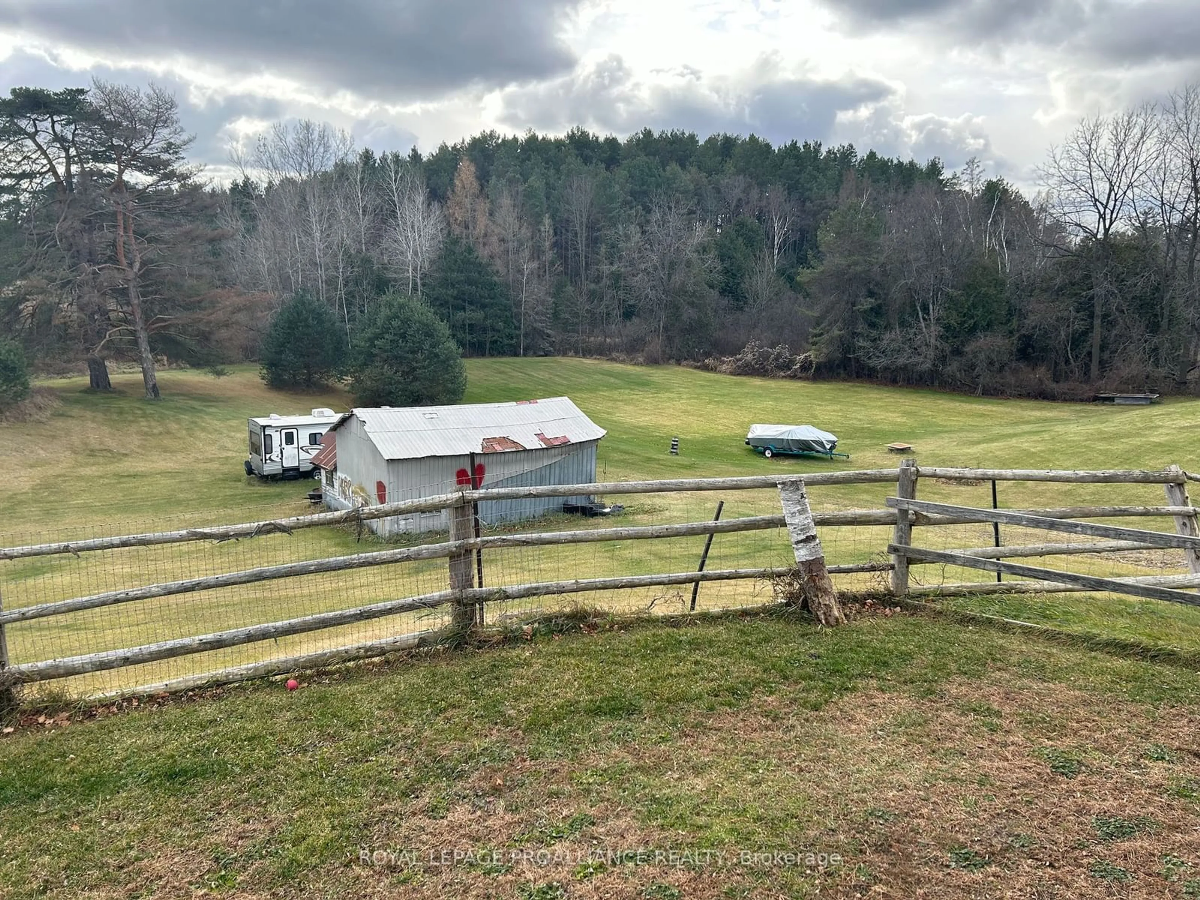 A pic from outside/outdoor area/front of a property/back of a property/a pic from drone, mountain view for 1573 County Road 5, Quinte West Ontario K0K 2C0