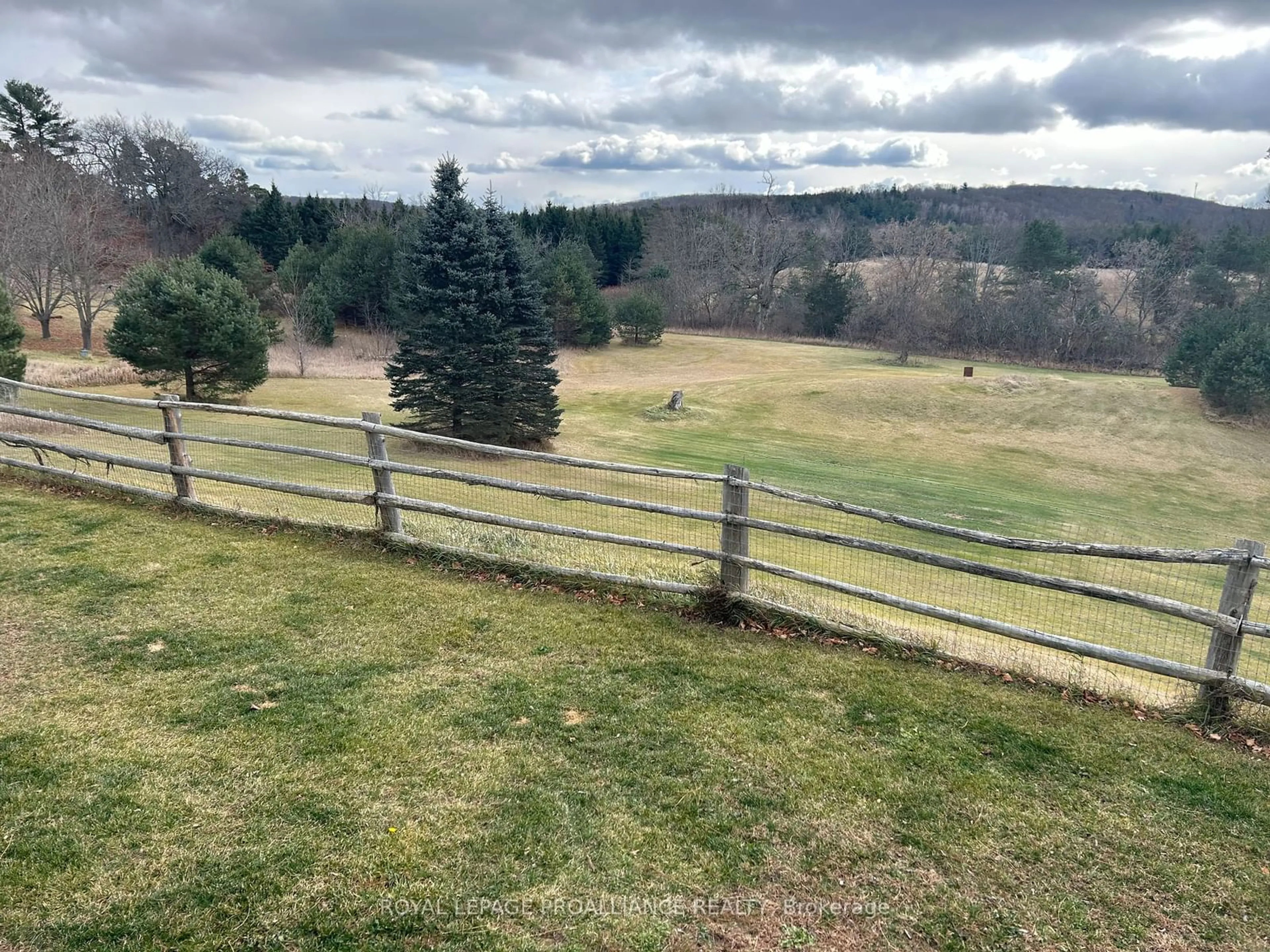 A pic from outside/outdoor area/front of a property/back of a property/a pic from drone, forest/trees view for 1573 County Road 5, Quinte West Ontario K0K 2C0