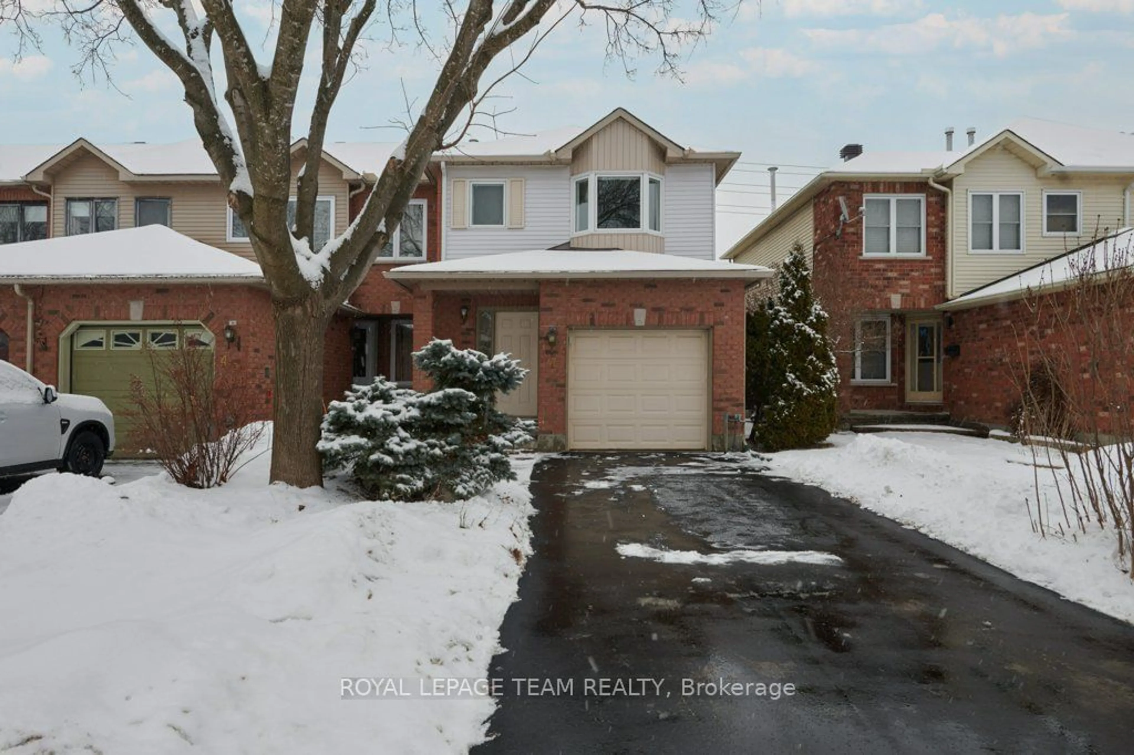 A pic from outside/outdoor area/front of a property/back of a property/a pic from drone, street for 47 Grenadier Way, Barrhaven Ontario K2J 4L4