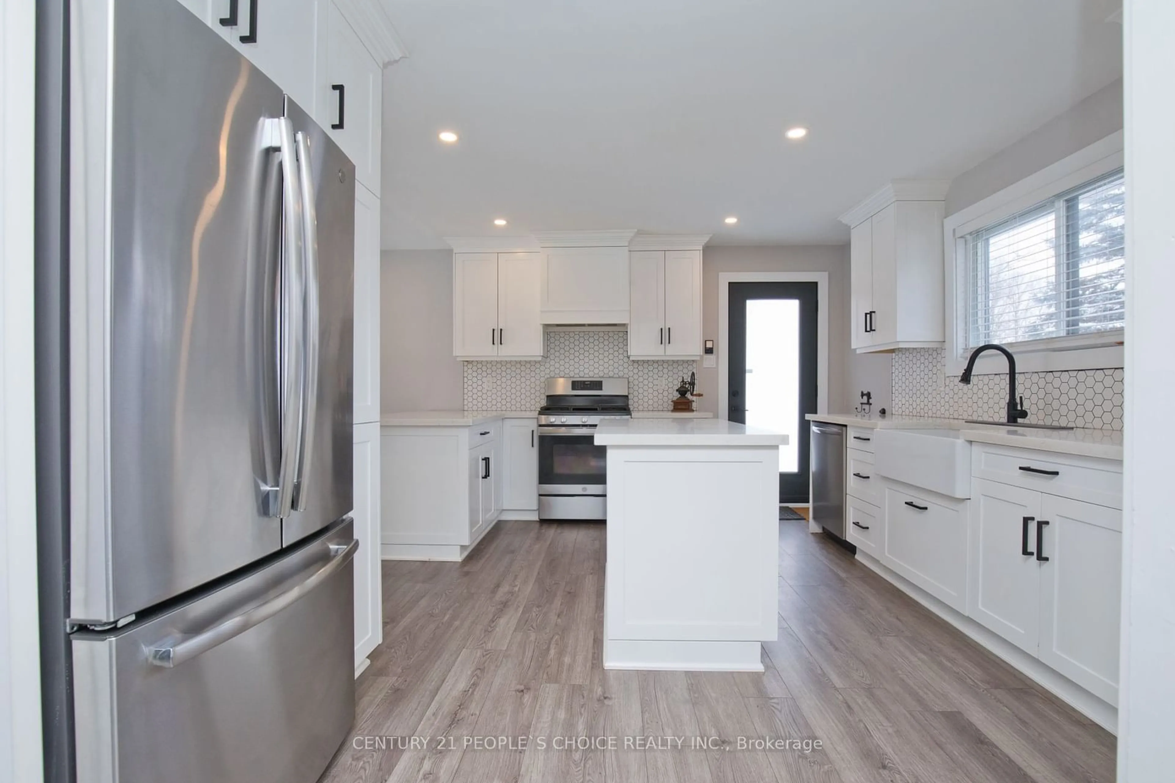 Open concept kitchen, wood/laminate floor for 15 Delerin Cres, Erin Ontario N0B 1T0