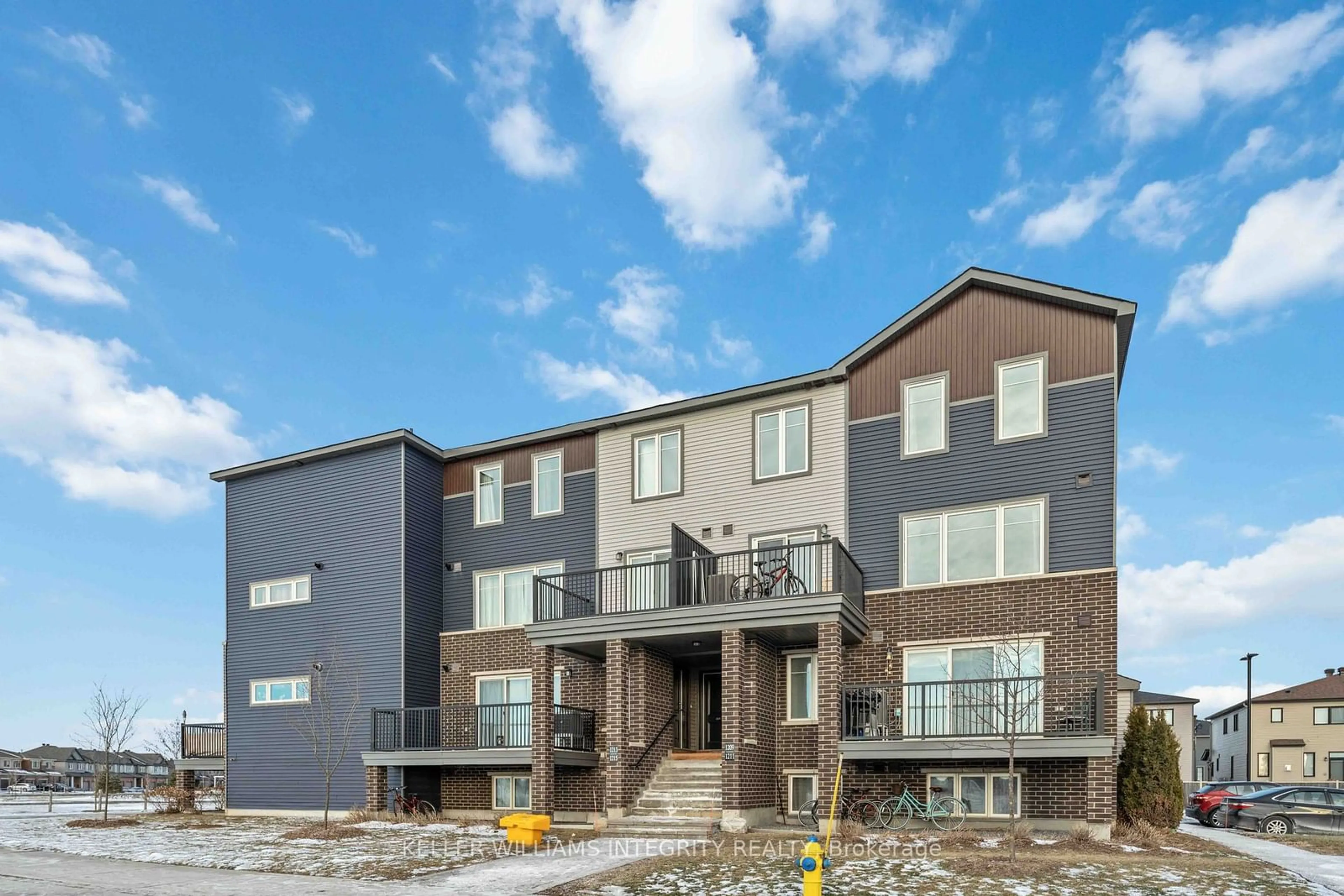 Home with brick exterior material, building for 1211 Chapman Mills Dr #3, Barrhaven Ontario K2J 6R5