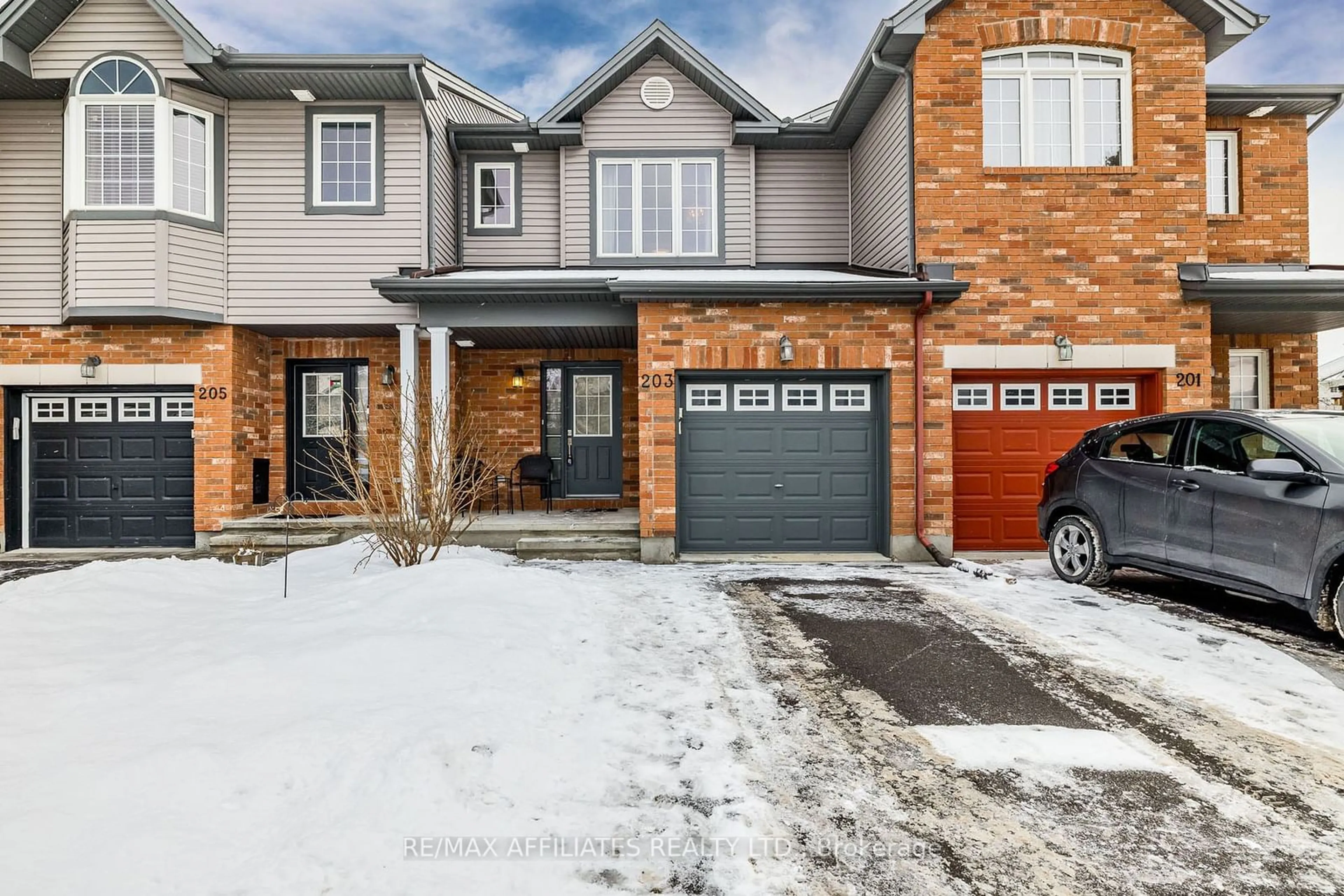 Home with brick exterior material, street for 203 Opus St, Kanata Ontario K2S 0J2