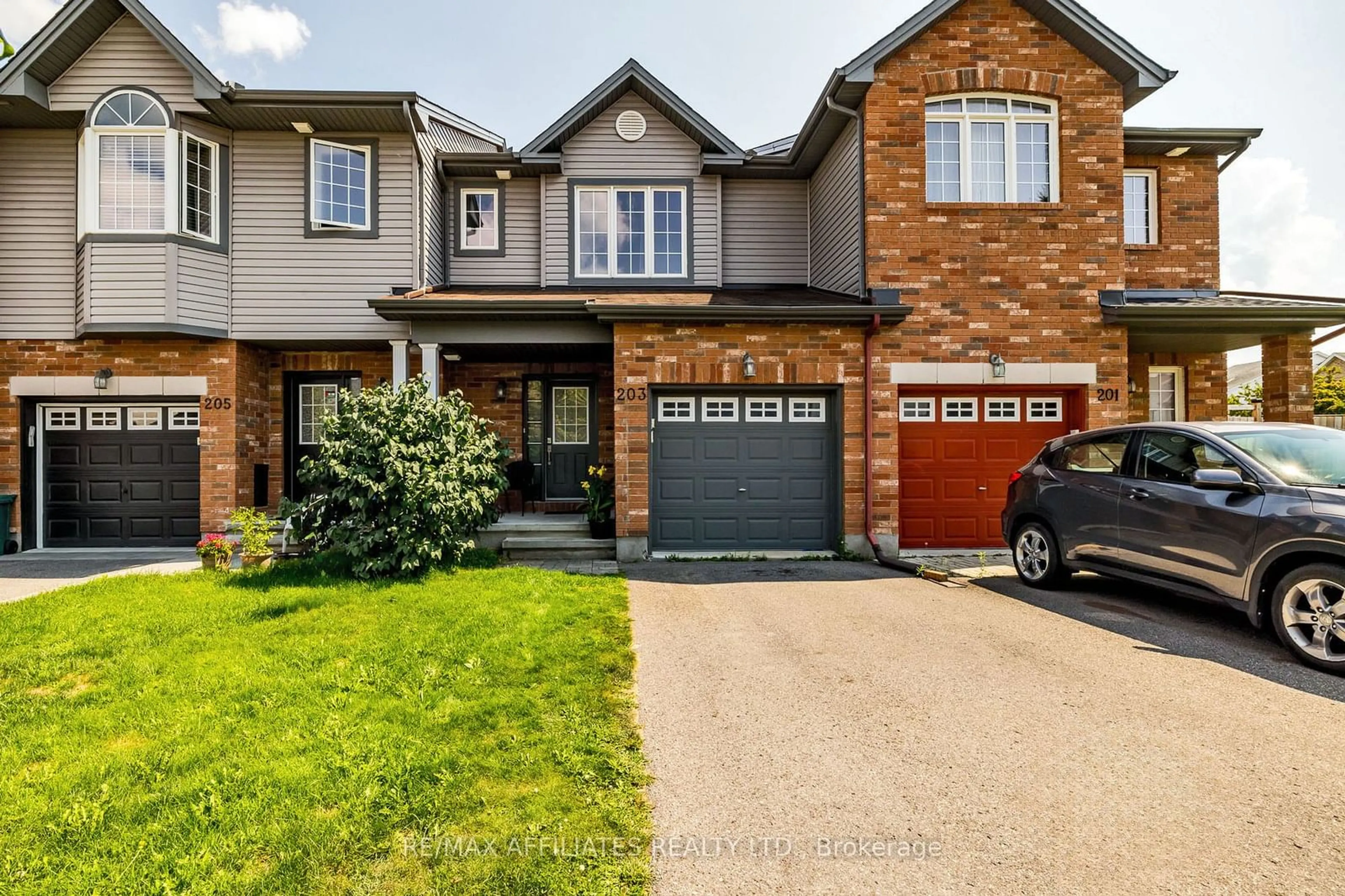 Home with brick exterior material, street for 203 Opus St, Kanata Ontario K2S 0J2