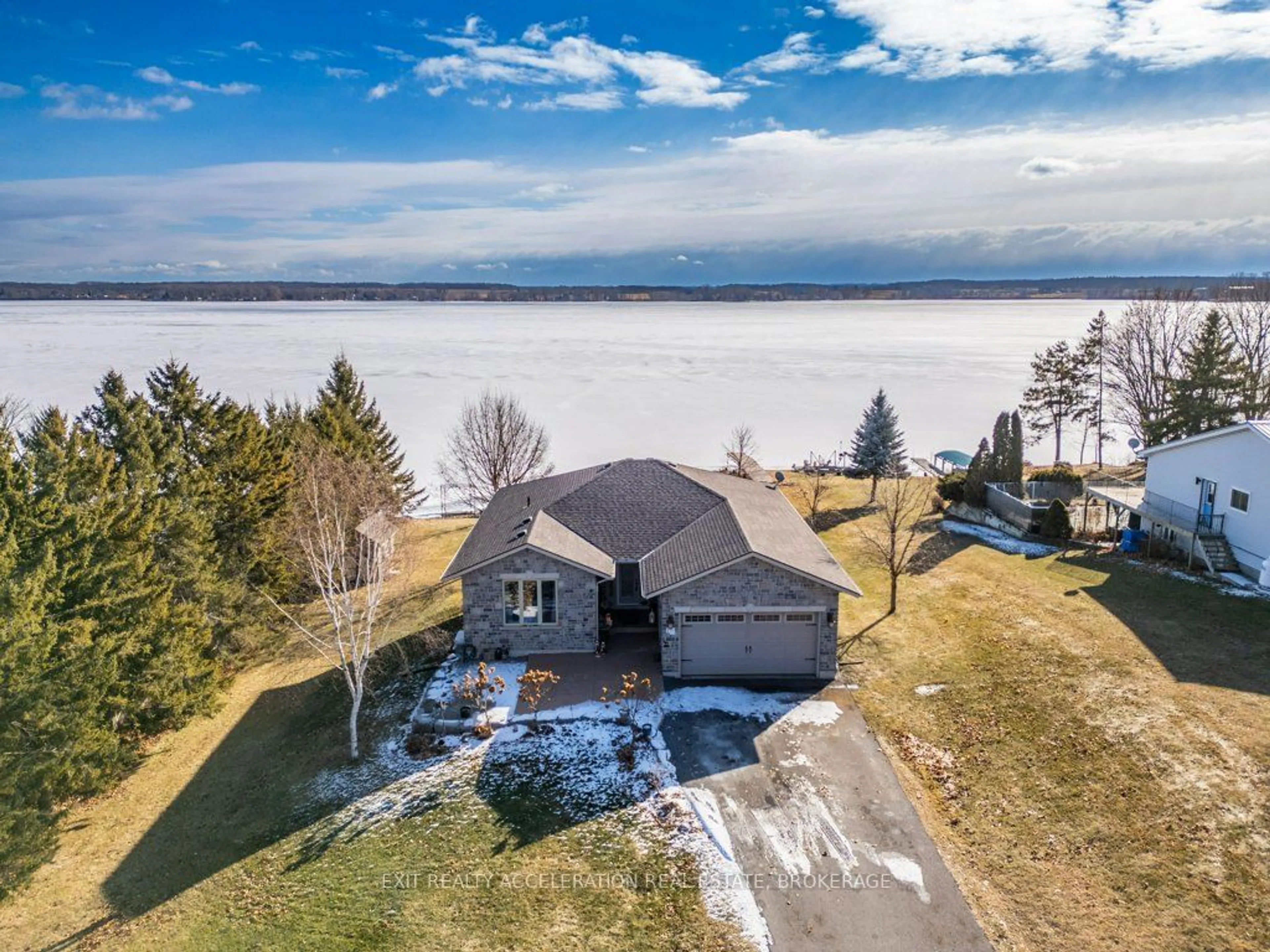 A pic from outside/outdoor area/front of a property/back of a property/a pic from drone, water/lake/river/ocean view for 92 Bayview Dr, Greater Napanee Ontario K7R 3K8