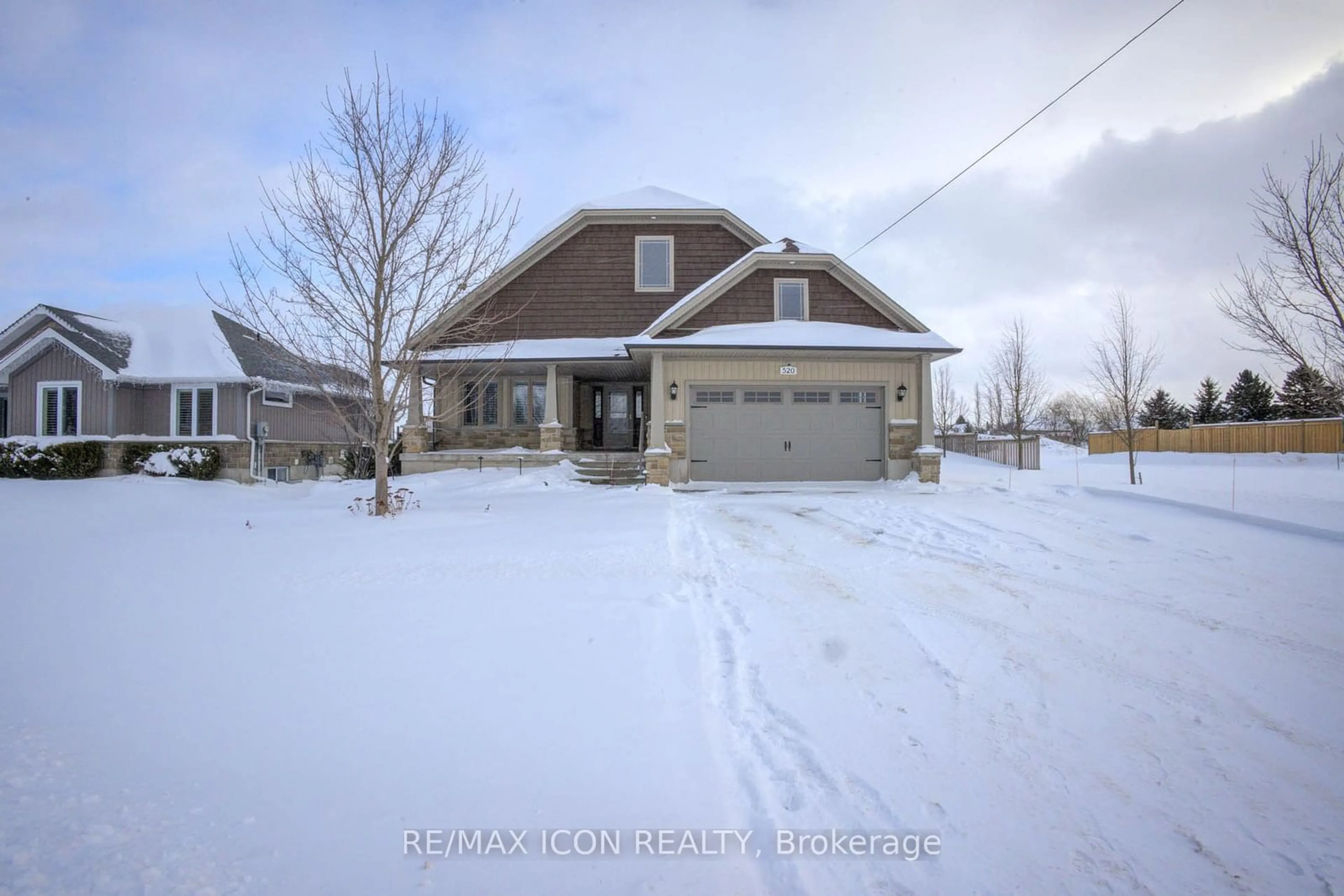 A pic from outside/outdoor area/front of a property/back of a property/a pic from drone, street for 520 Wellington St, Wellington North Ontario N0G 2L2