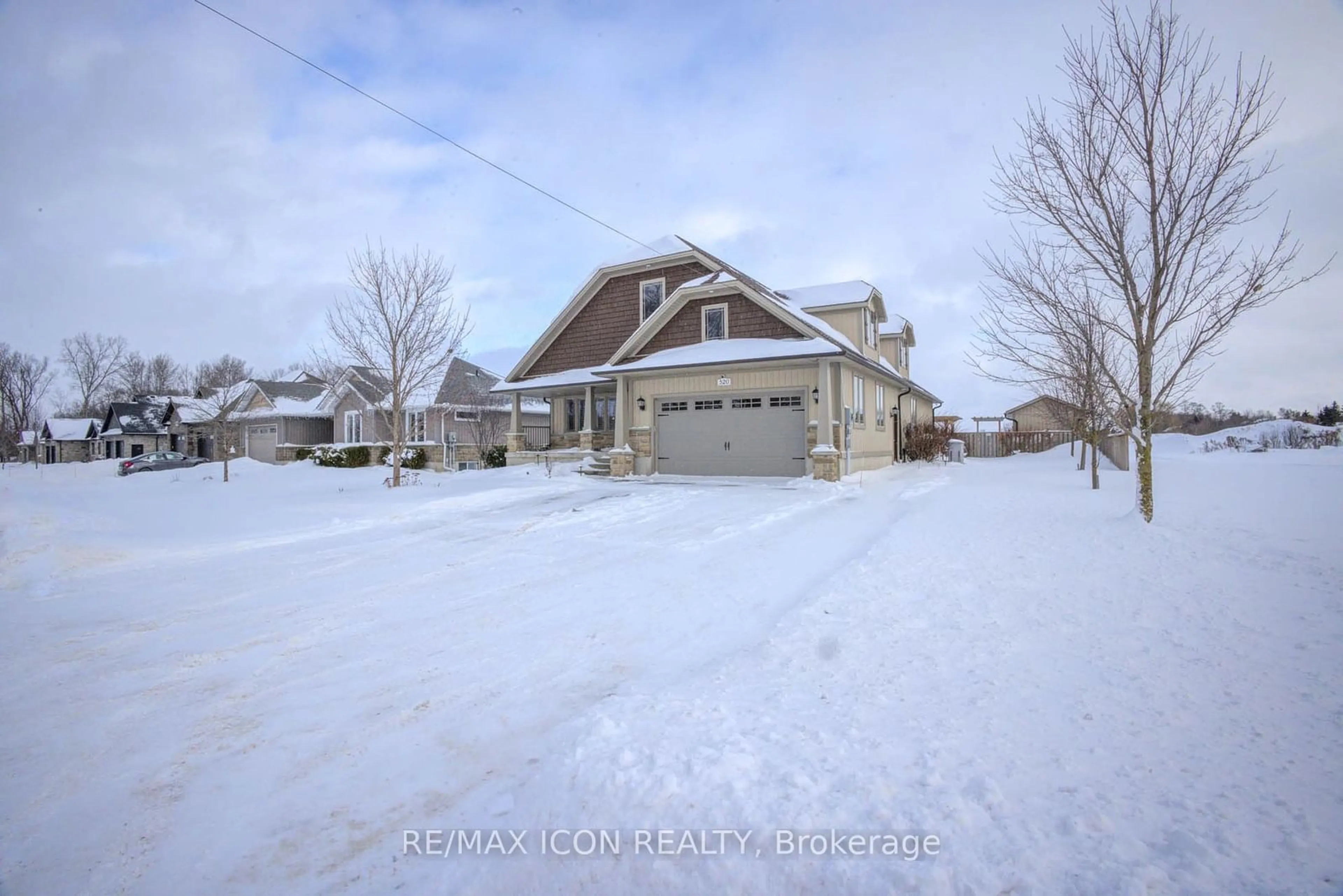 A pic from outside/outdoor area/front of a property/back of a property/a pic from drone, street for 520 Wellington St, Wellington North Ontario N0G 2L2