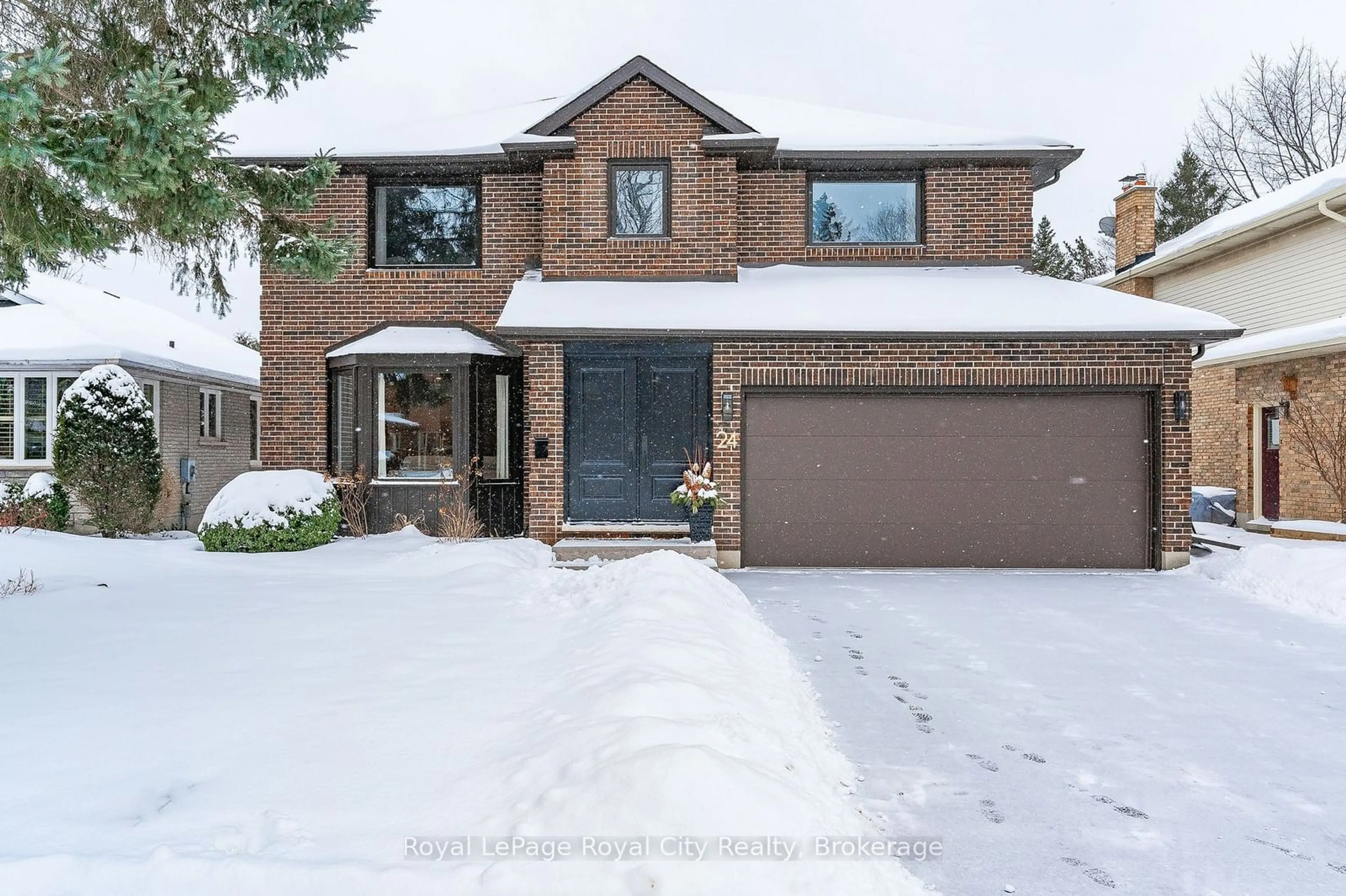 Home with brick exterior material, street for 24 Bridlewood Dr, Guelph Ontario N1G 4B1