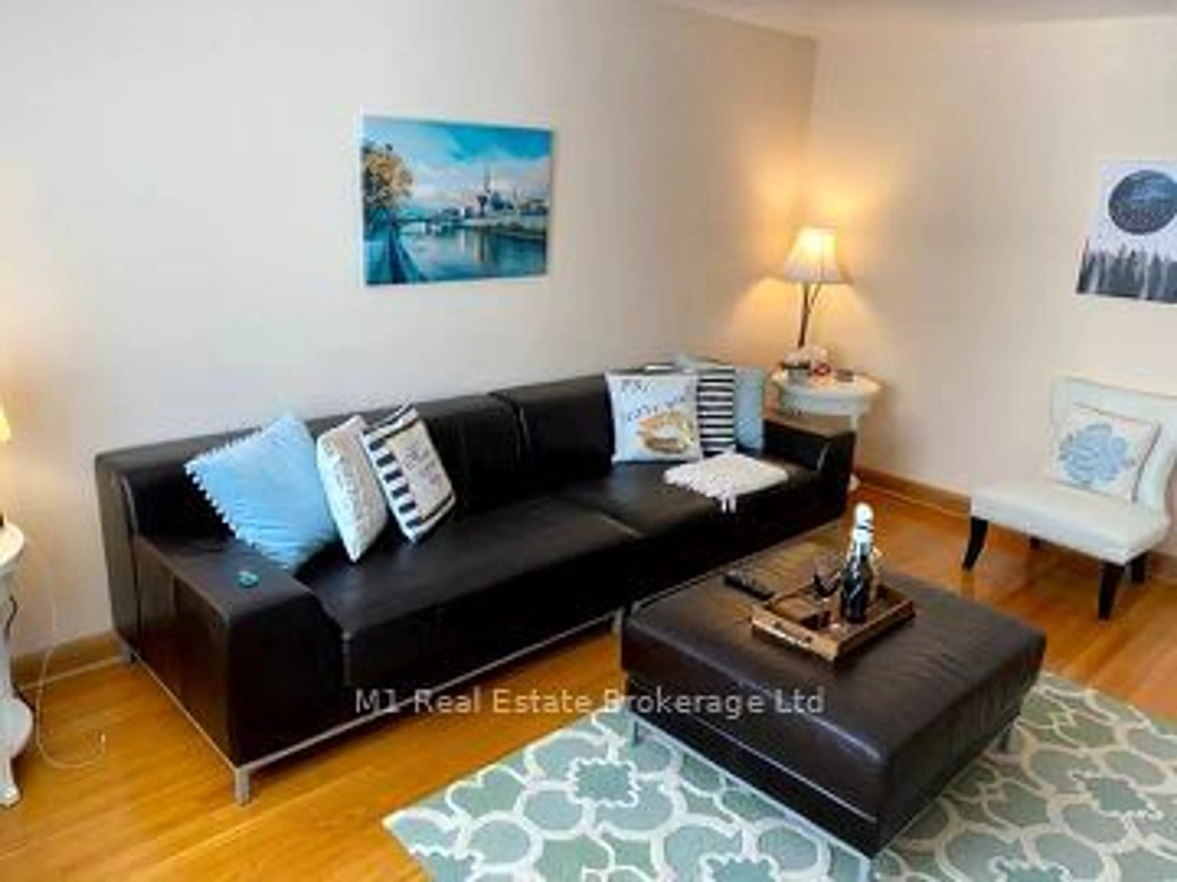 Living room with furniture, wood/laminate floor for 70 Dudhope Ave, Cambridge Ontario N1R 4T7