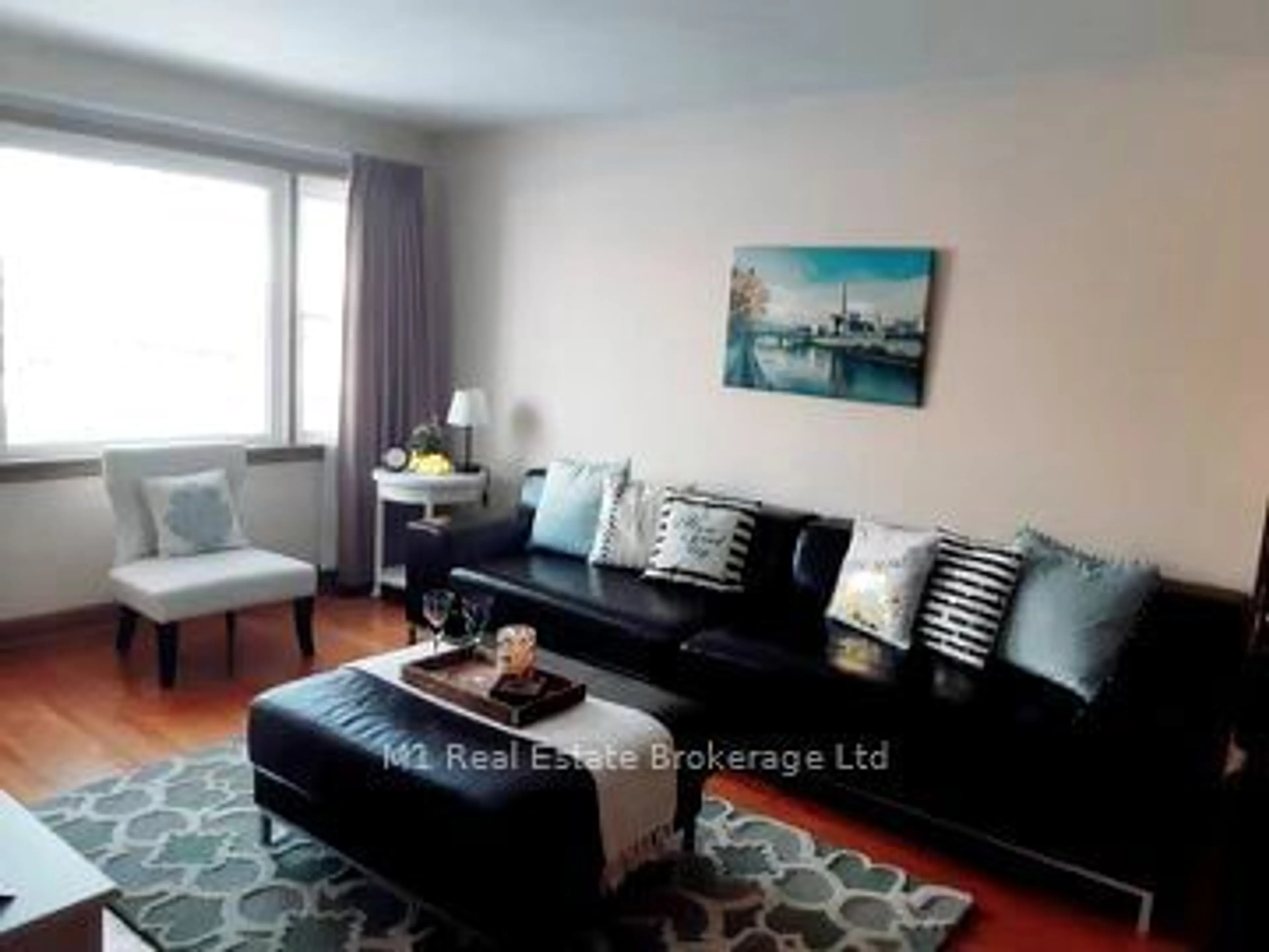 Living room with furniture, wood/laminate floor for 70 Dudhope Ave, Cambridge Ontario N1R 4T7