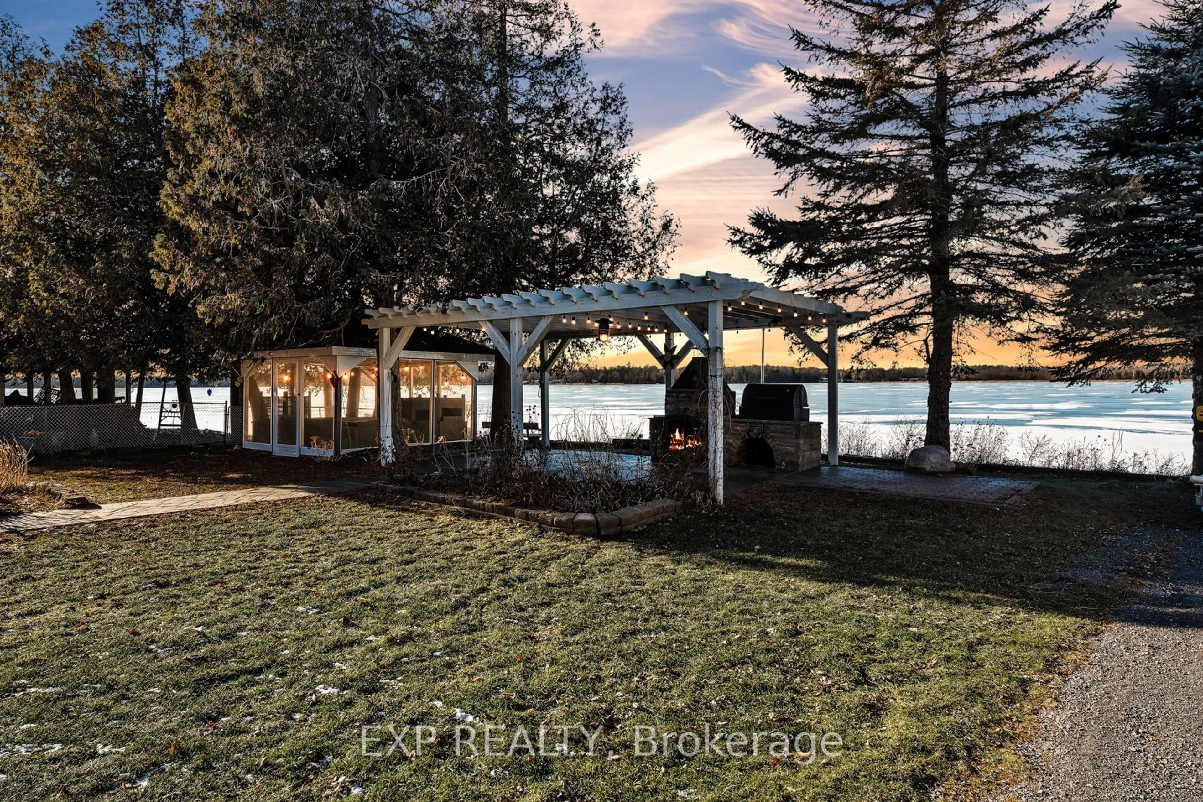 A pic from outside/outdoor area/front of a property/back of a property/a pic from drone, water/lake/river/ocean view for 155 Red Cedar Pt Rd, Stone Mills Ontario K0K 3N0