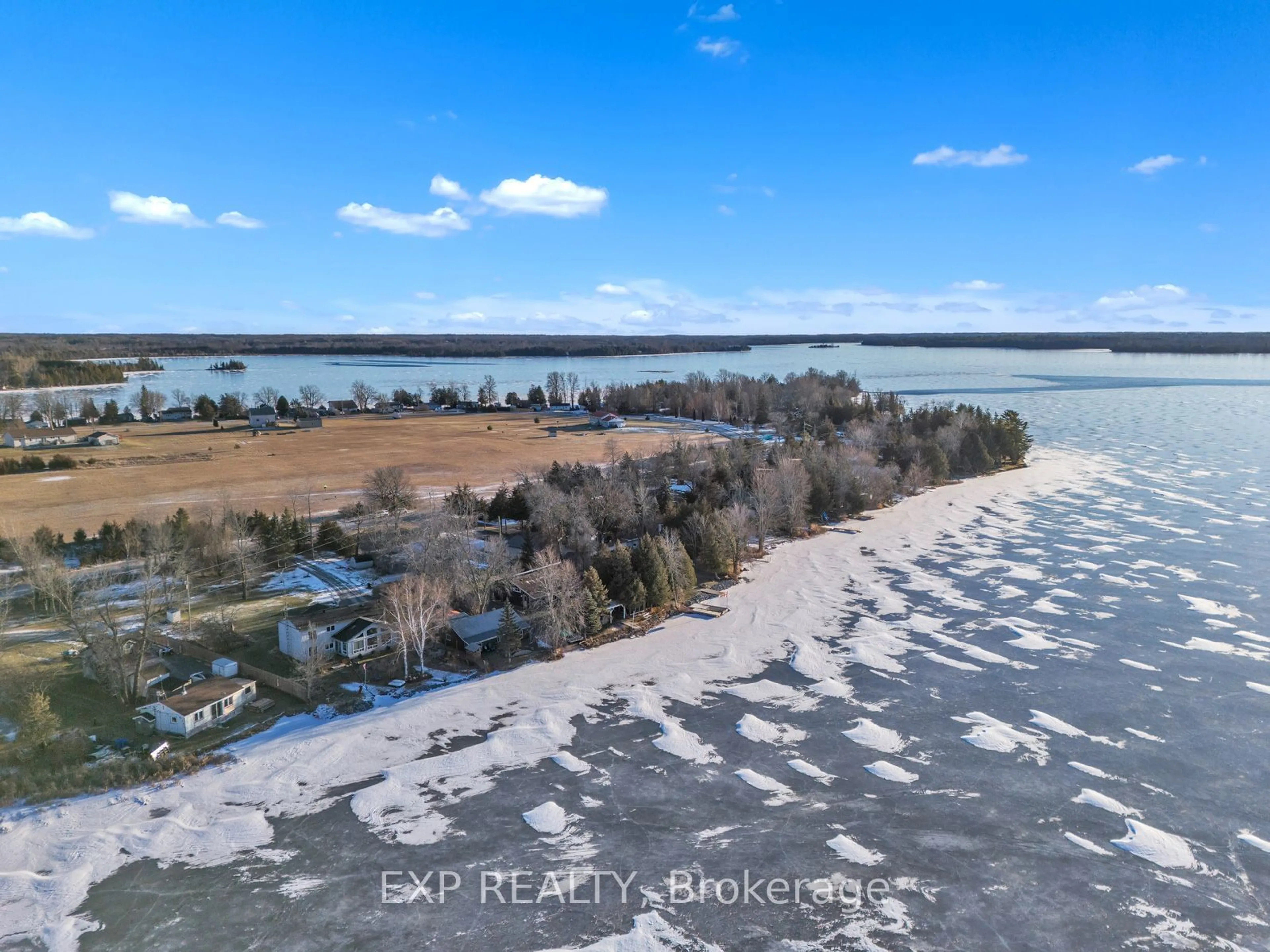 A pic from outside/outdoor area/front of a property/back of a property/a pic from drone, water/lake/river/ocean view for 155 Red Cedar Pt Rd, Stone Mills Ontario K0K 3N0