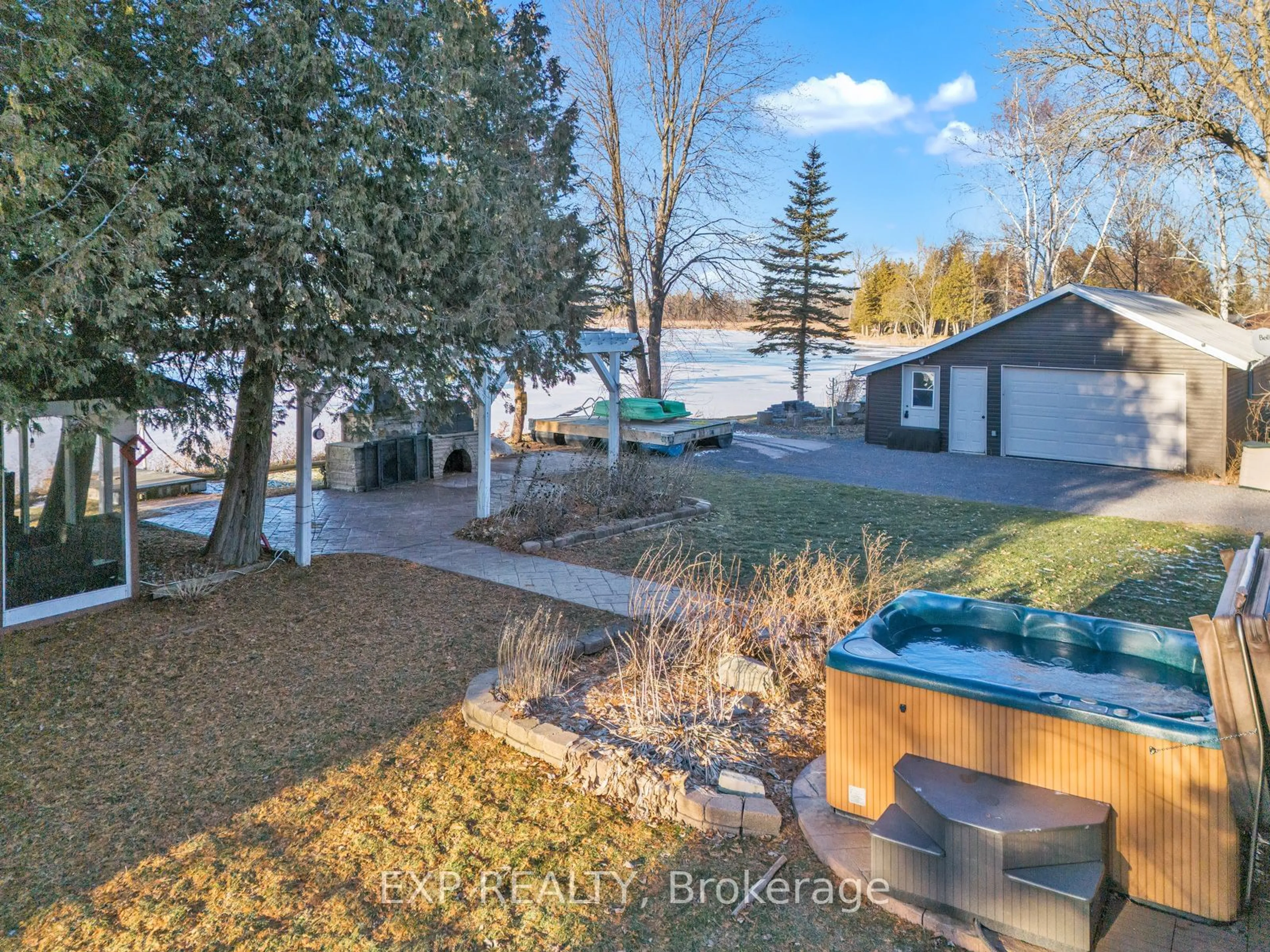 A pic from outside/outdoor area/front of a property/back of a property/a pic from drone, water/lake/river/ocean view for 155 Red Cedar Pt Rd, Stone Mills Ontario K0K 3N0