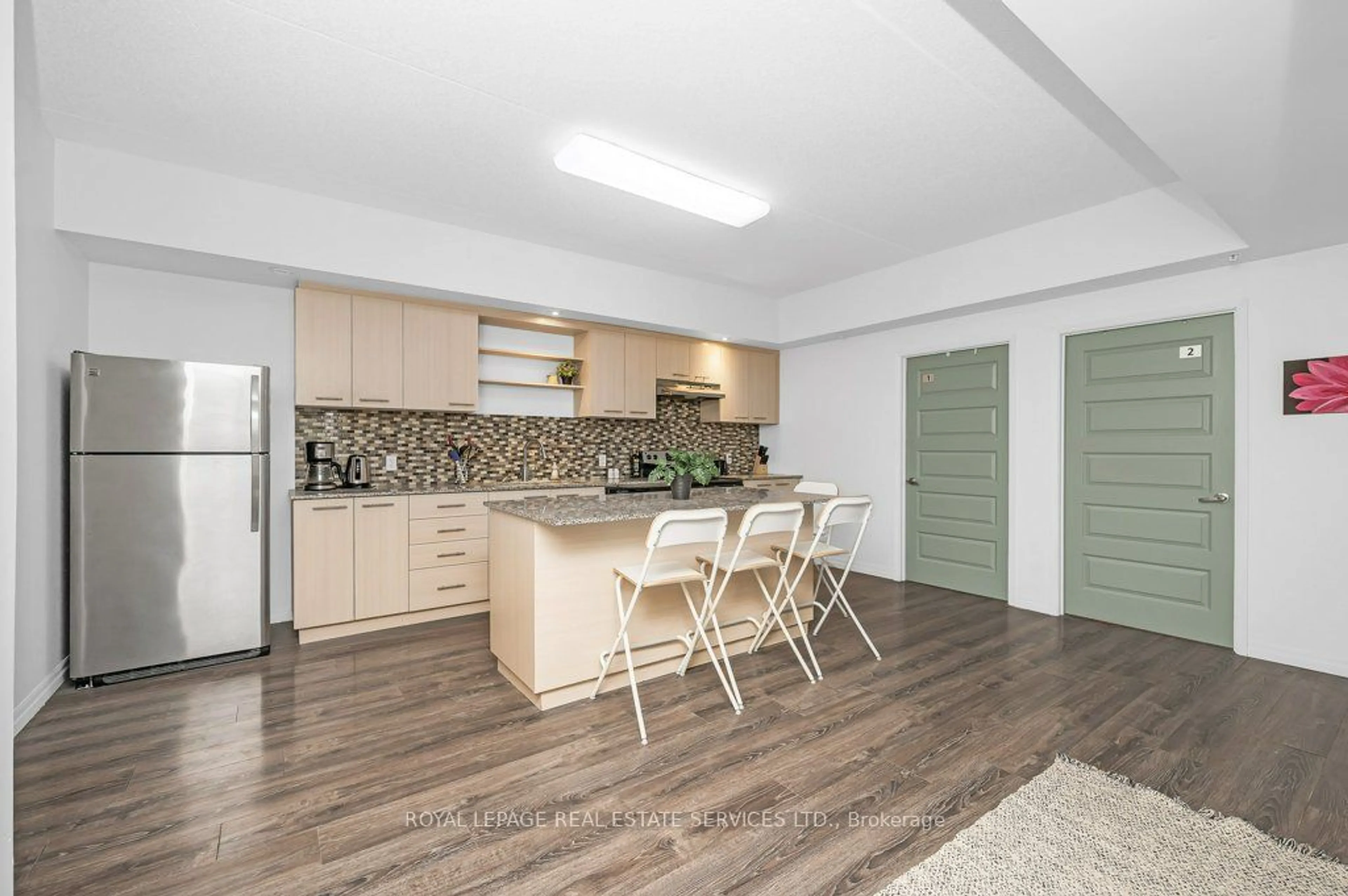 Open concept kitchen, wood/laminate floor for 8 Hickory St, Waterloo Ontario N2L 3H6