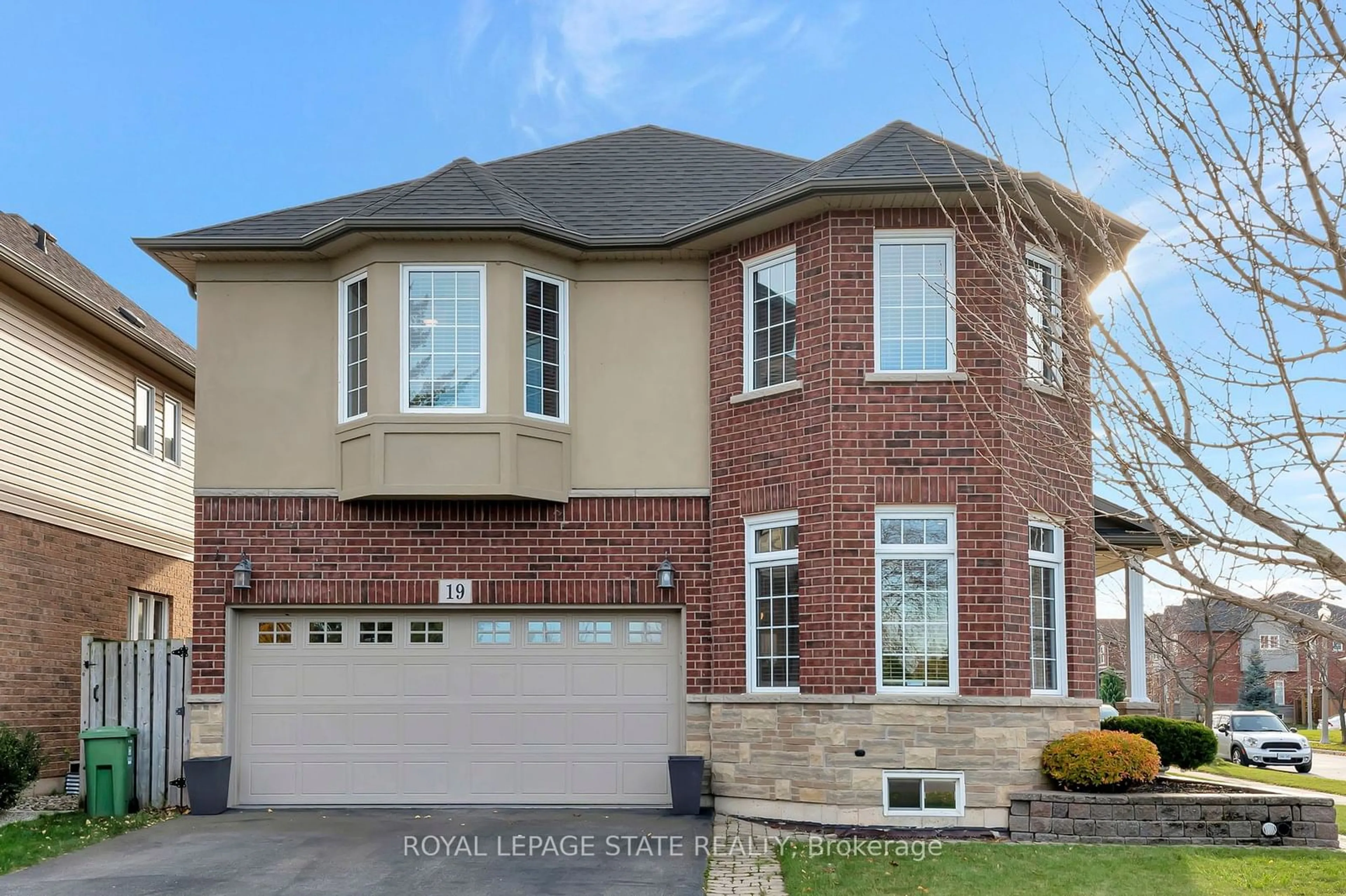 Home with brick exterior material, street for 19 Watershore Dr, Hamilton Ontario L8E 0C1