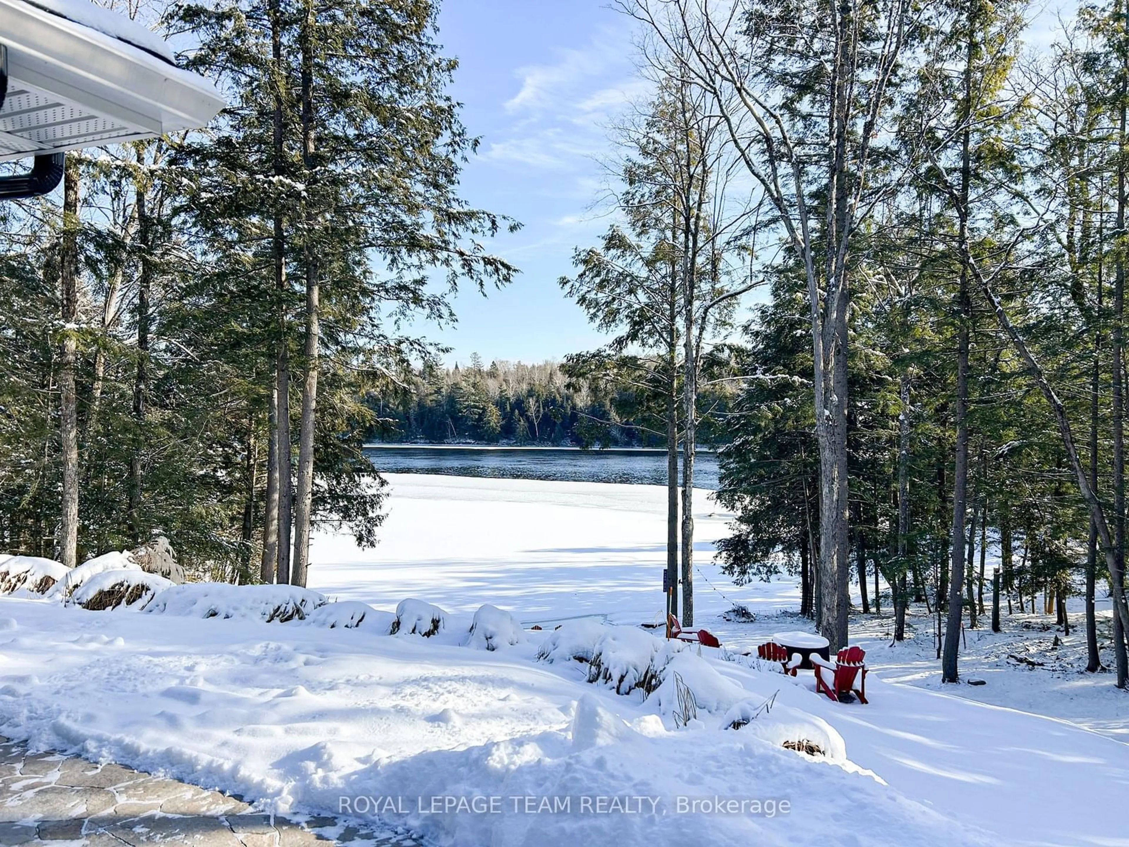 A pic from outside/outdoor area/front of a property/back of a property/a pic from drone, water/lake/river/ocean view for 121 Charlies Lane, Greater Madawaska Ontario K0J 1G0