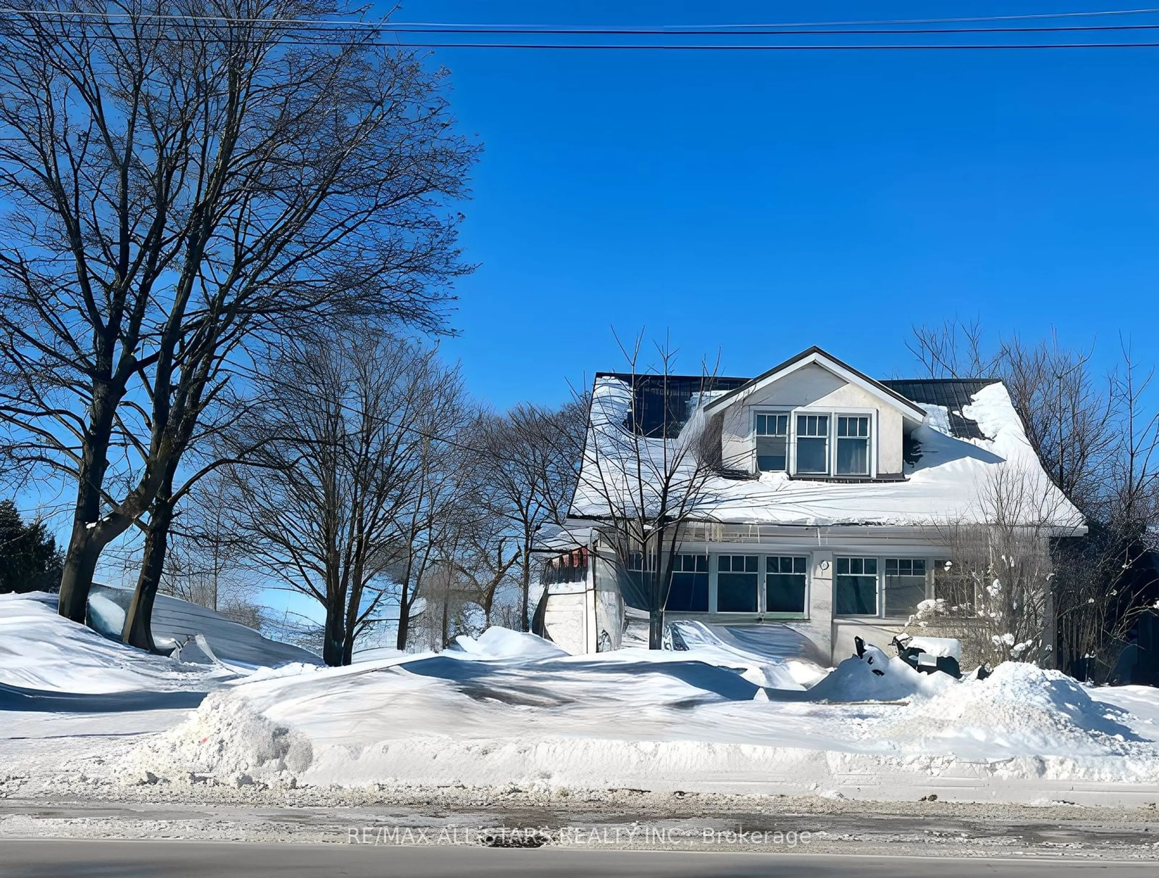 A pic from outside/outdoor area/front of a property/back of a property/a pic from drone, street for 4099 Hwy 35, Kawartha Lakes Ontario K0M 1G0