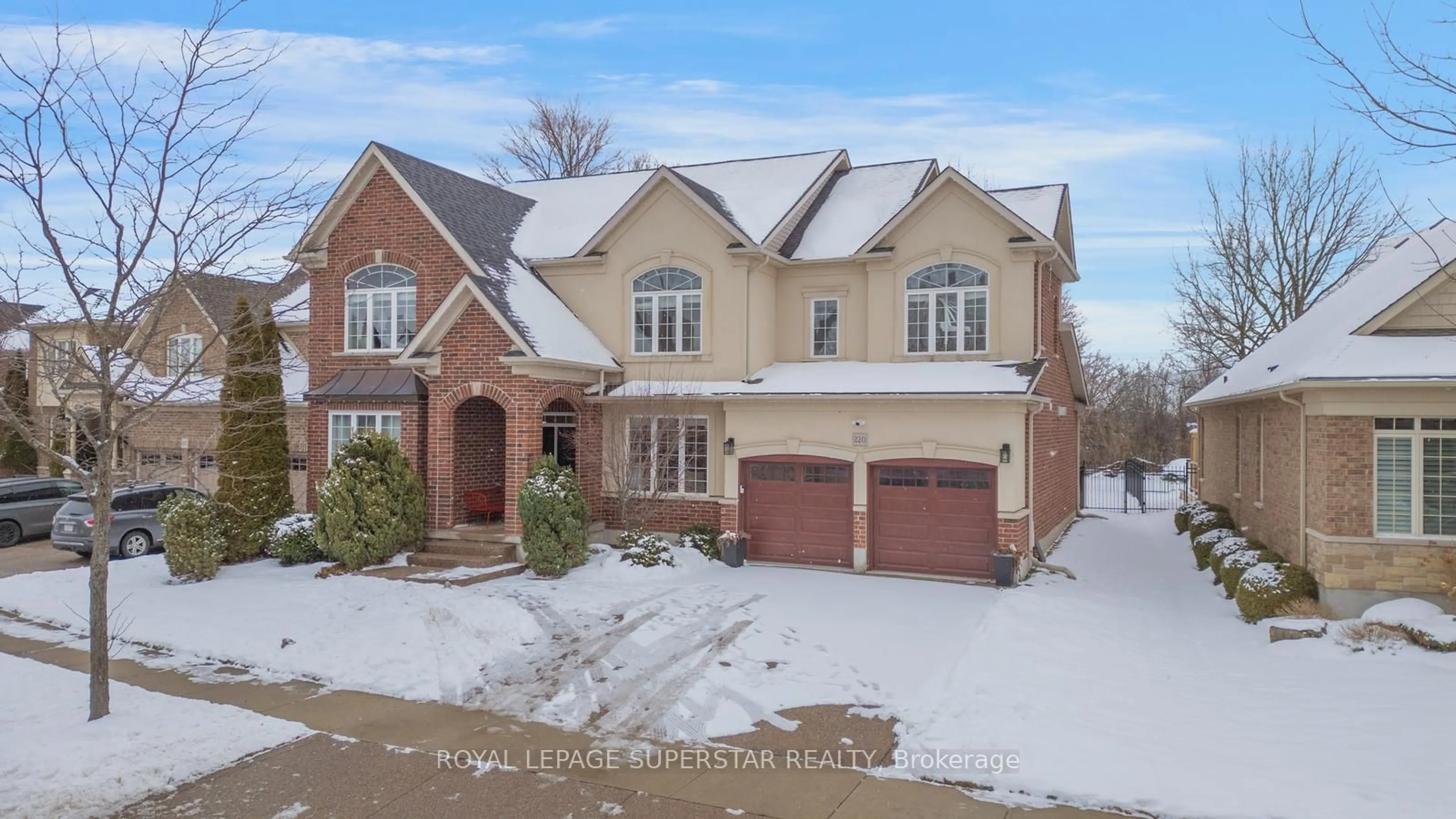 Home with brick exterior material, street for 220 EDGEWATER Cres, Kitchener Ontario N2A 4M2