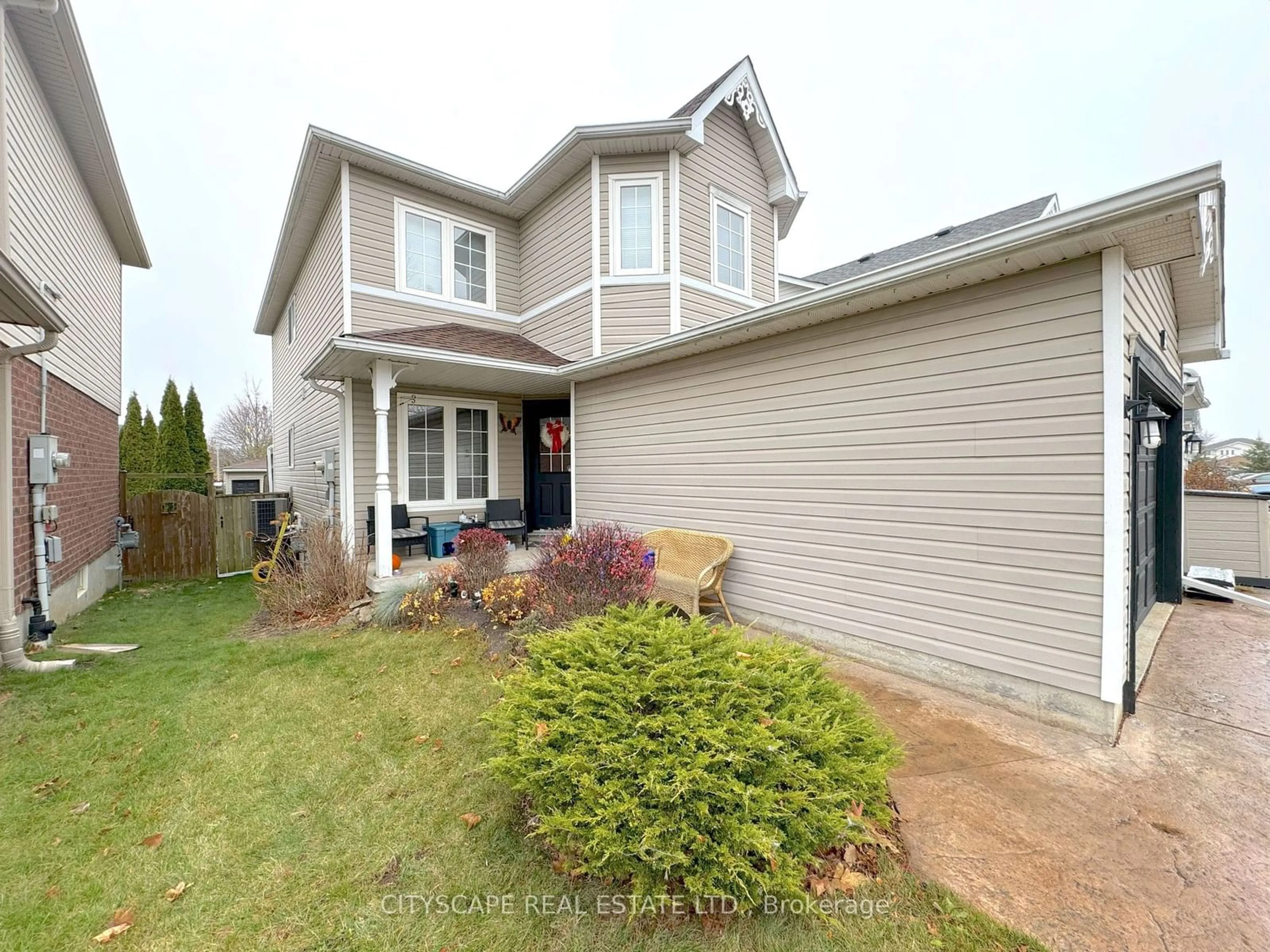 Home with vinyl exterior material, street for 55 Langlaw Dr, Cambridge Ontario N1P 1J1