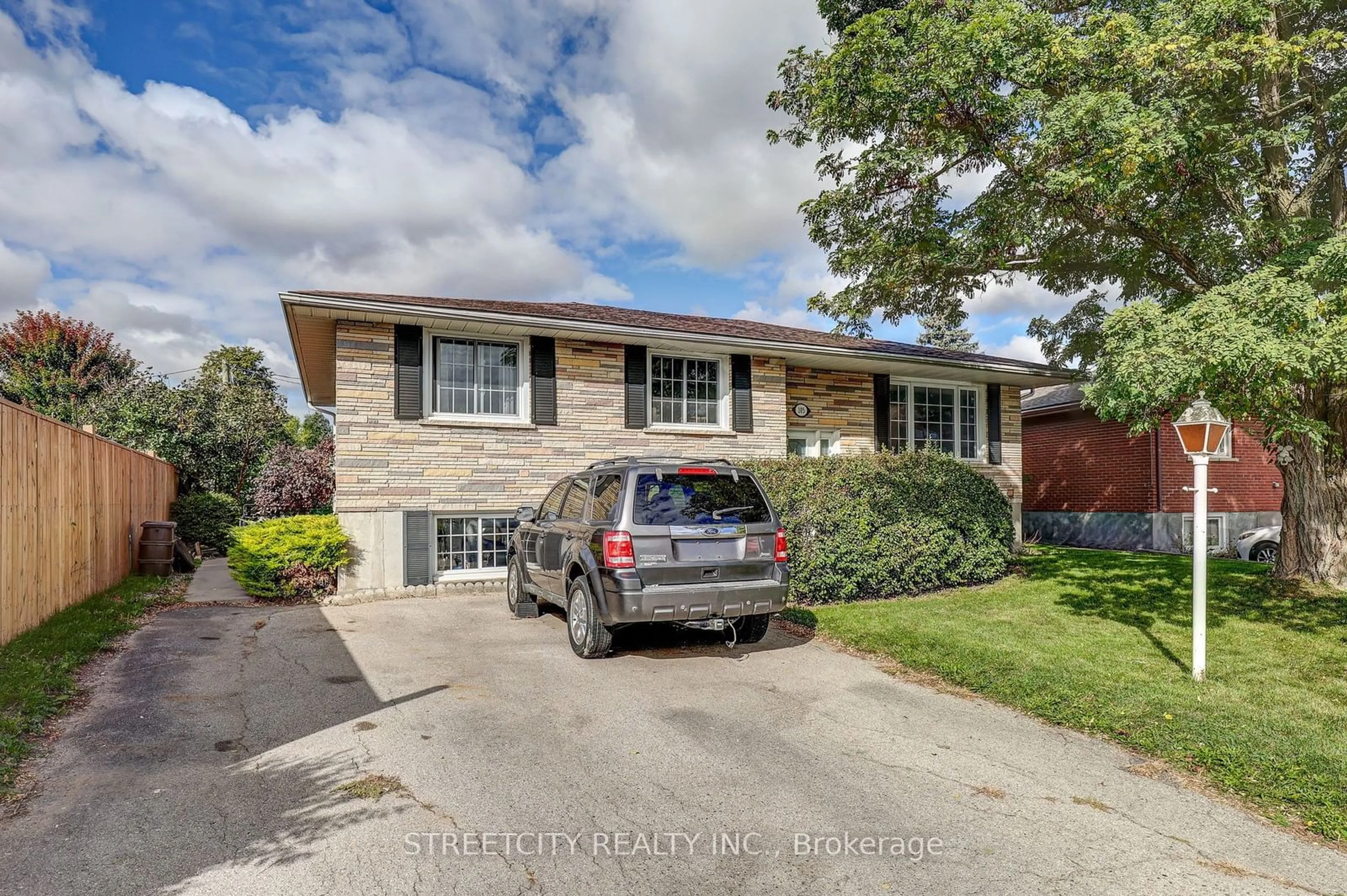 Home with brick exterior material, street for 105 Confederation Dr, St. Thomas Ontario N5P 3P6