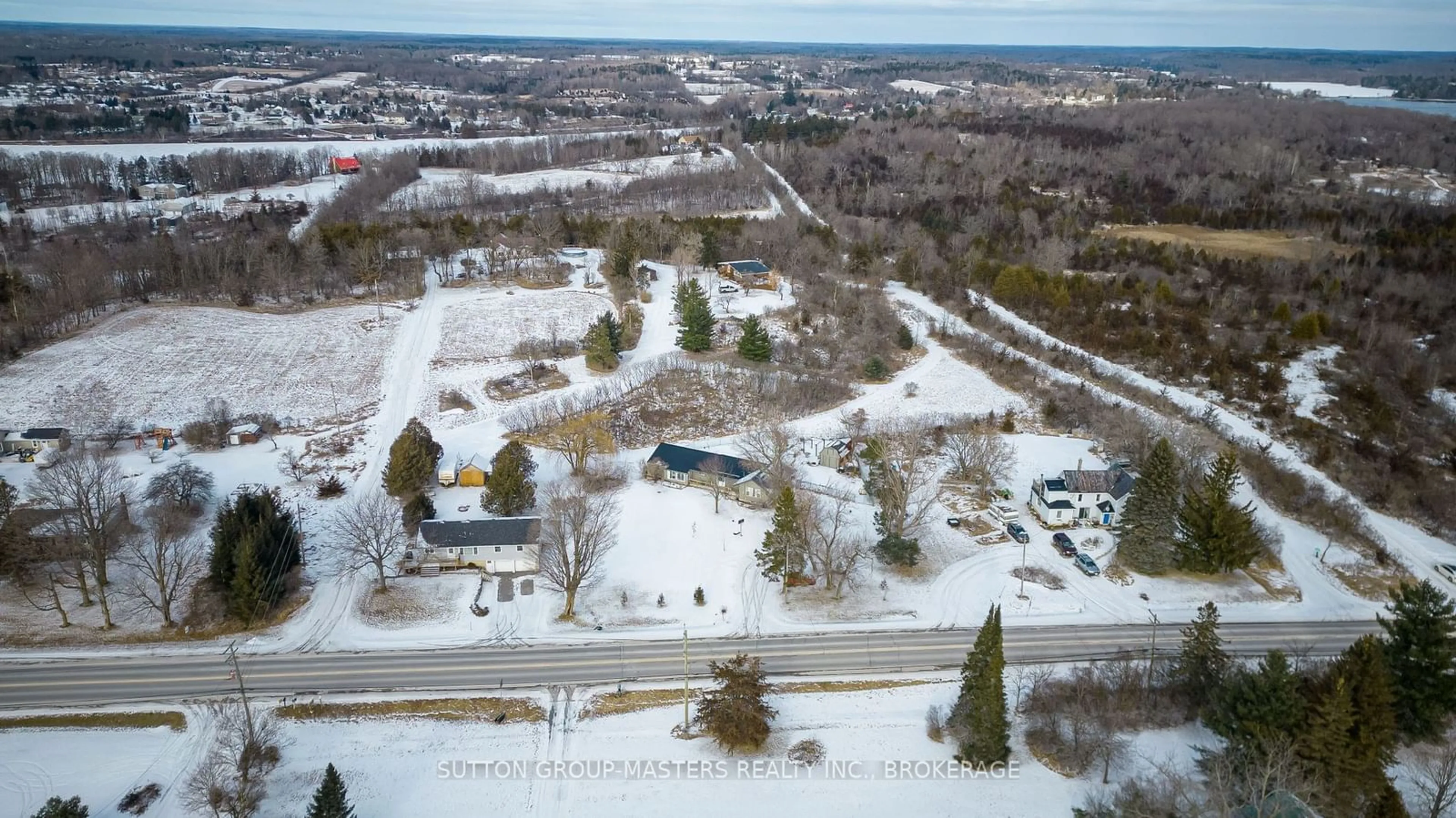 A pic from outside/outdoor area/front of a property/back of a property/a pic from drone, street for 2610 RUTLEDGE Rd #A & B, South Frontenac Ontario K0H 2T0