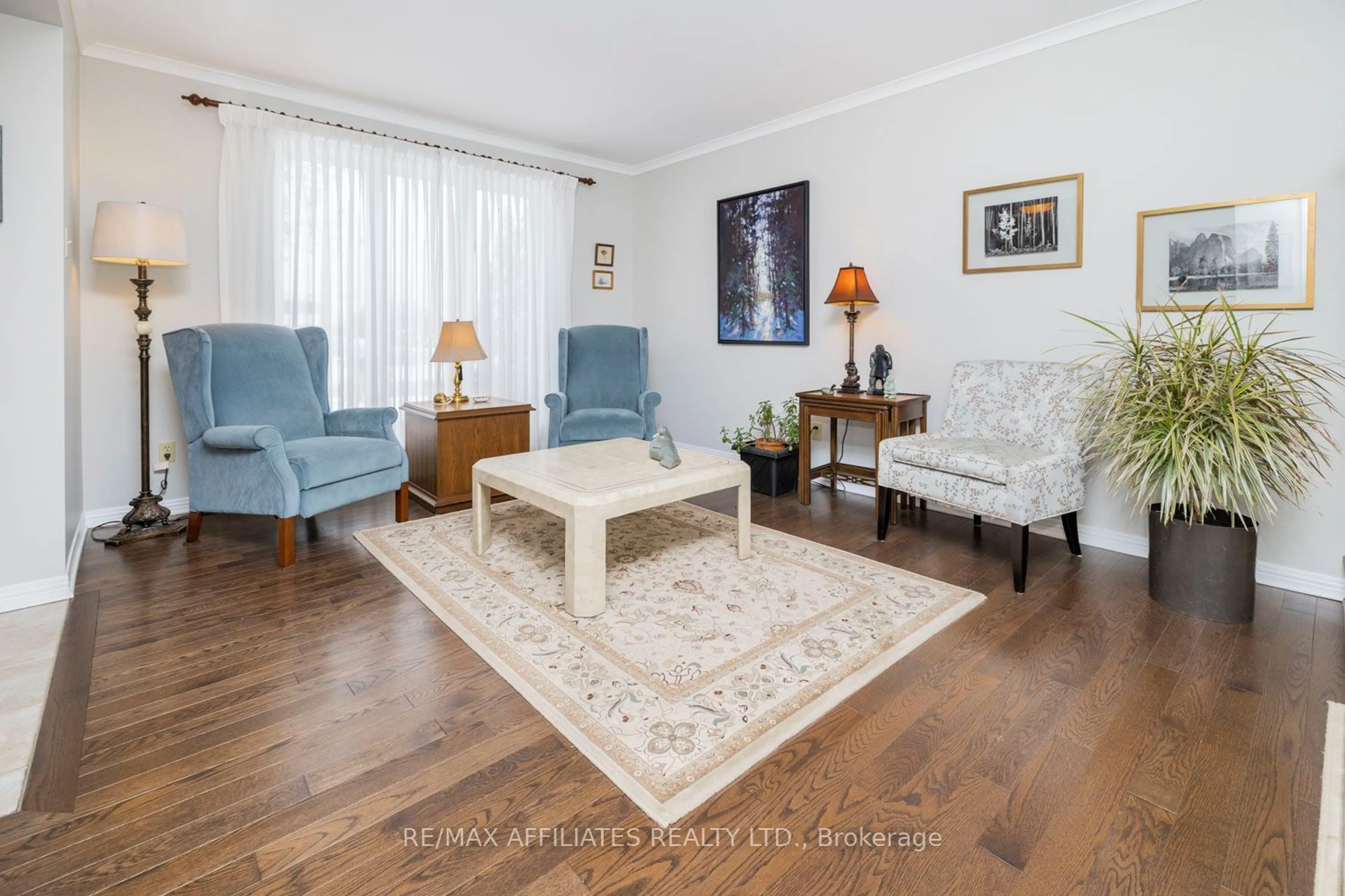 Living room with furniture, wood/laminate floor for 279 King St, Mississippi Mills Ontario K0A 1A0