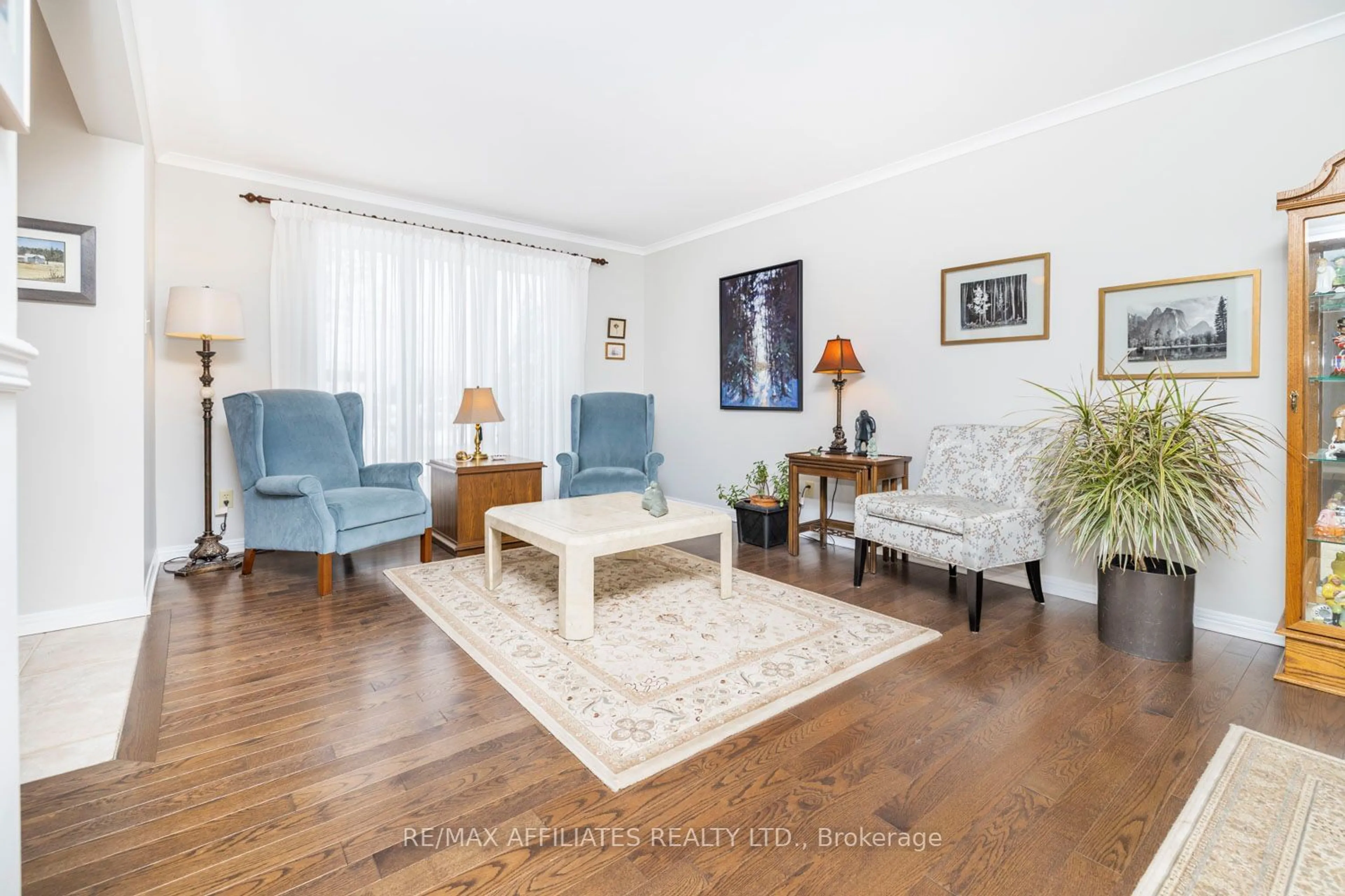 Living room with furniture, wood/laminate floor for 279 King St, Mississippi Mills Ontario K0A 1A0