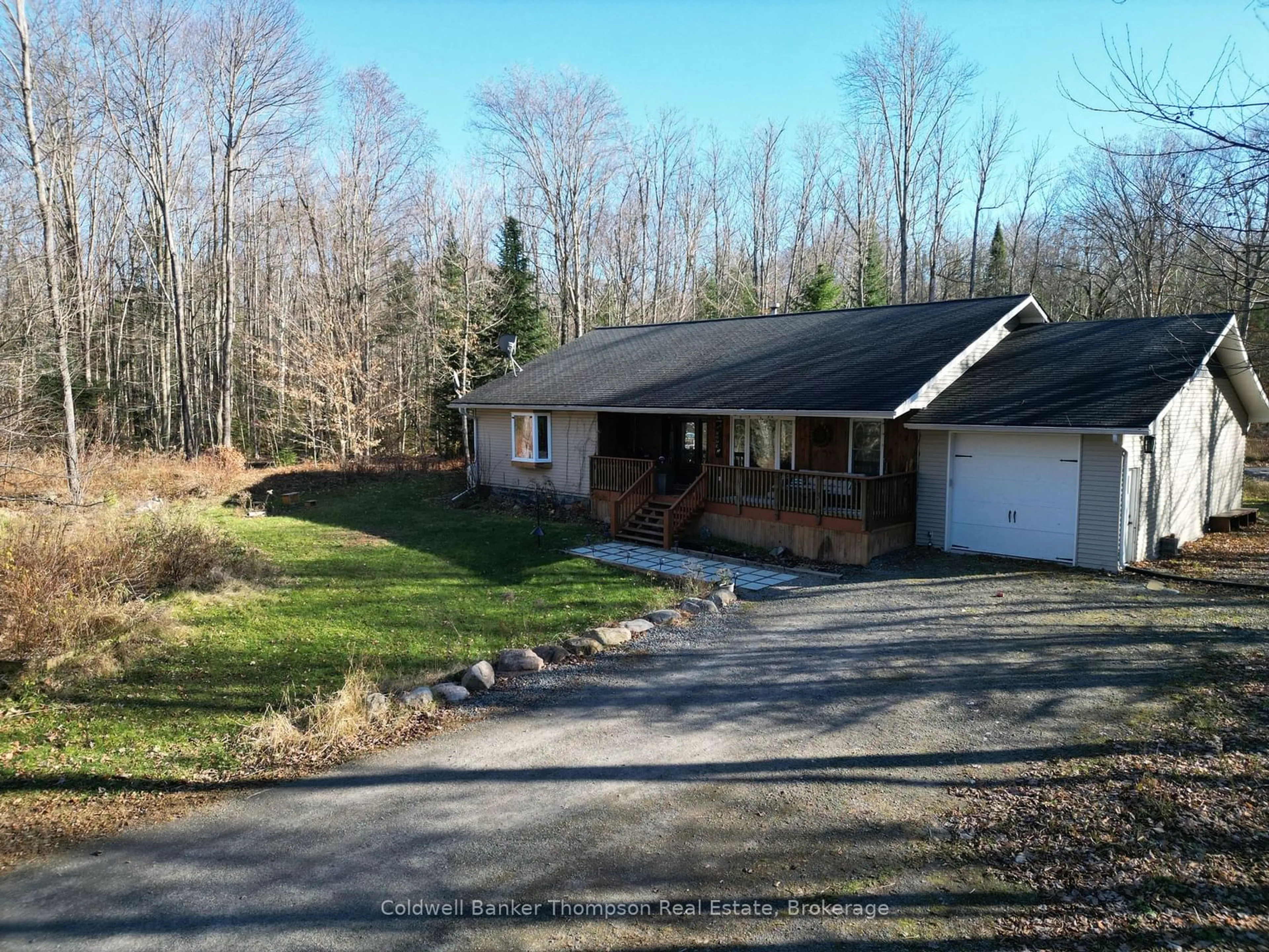 A pic from outside/outdoor area/front of a property/back of a property/a pic from drone, unknown for 1029 Williamsport Rd, Huntsville Ontario P1H 2J4