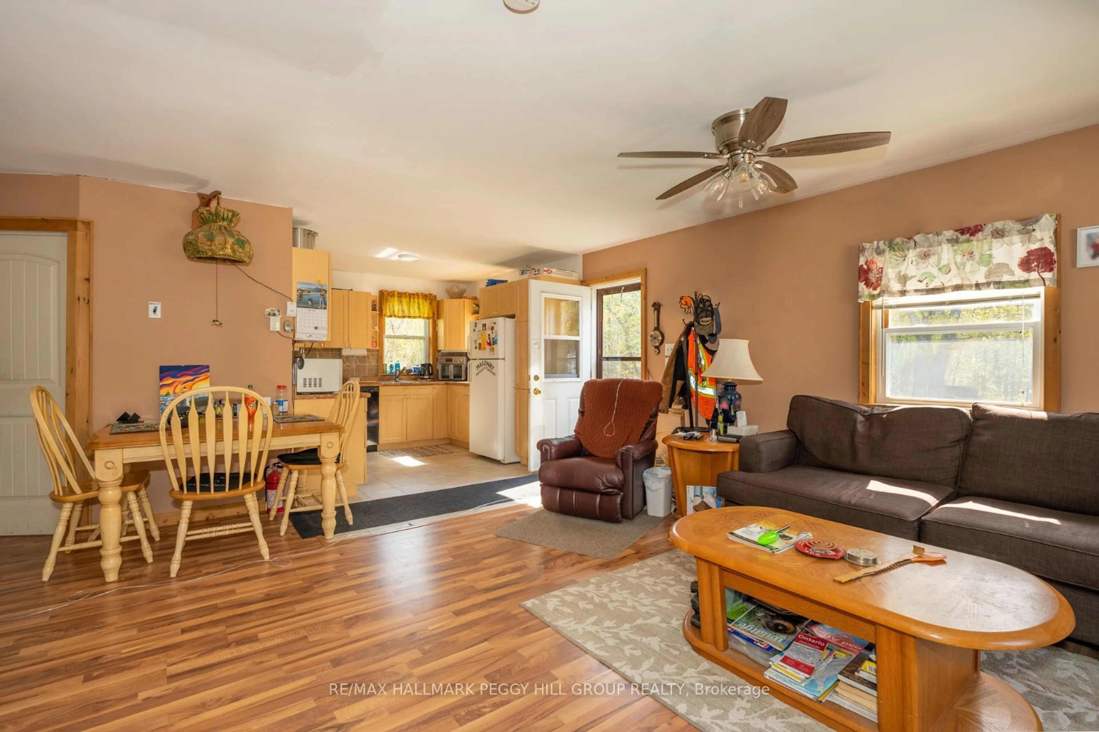 Living room with furniture, wood/laminate floor for 94 High St, Georgian Bay Ontario P0C 1H0